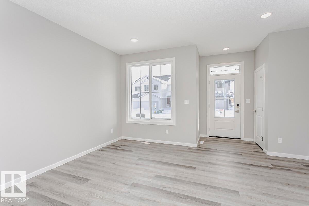 Photo 2 at 414 26 Street SW, Alces, Edmonton