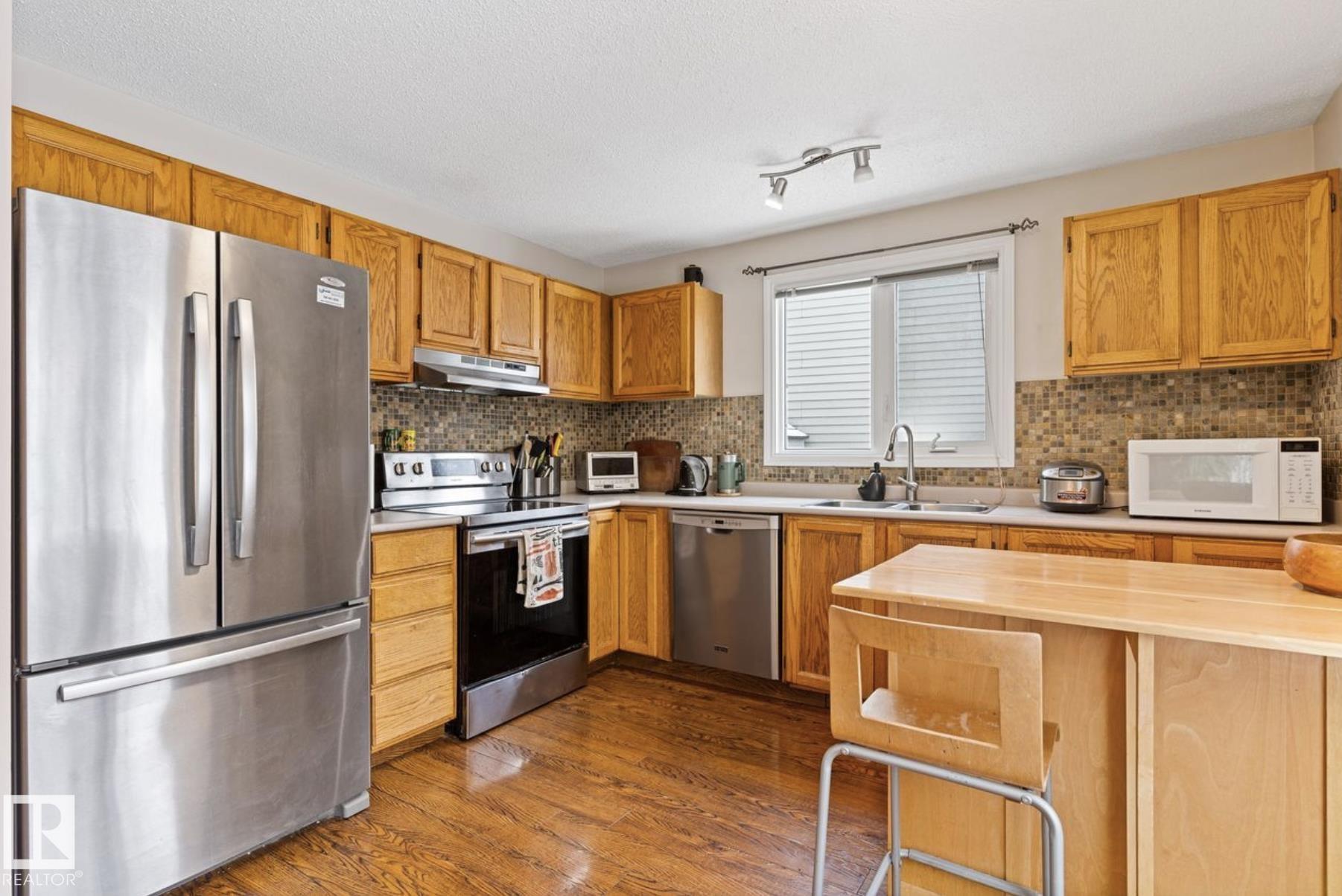 Photo 13 at 263 Vantage Lane, Village on the Lake, Sherwood Park