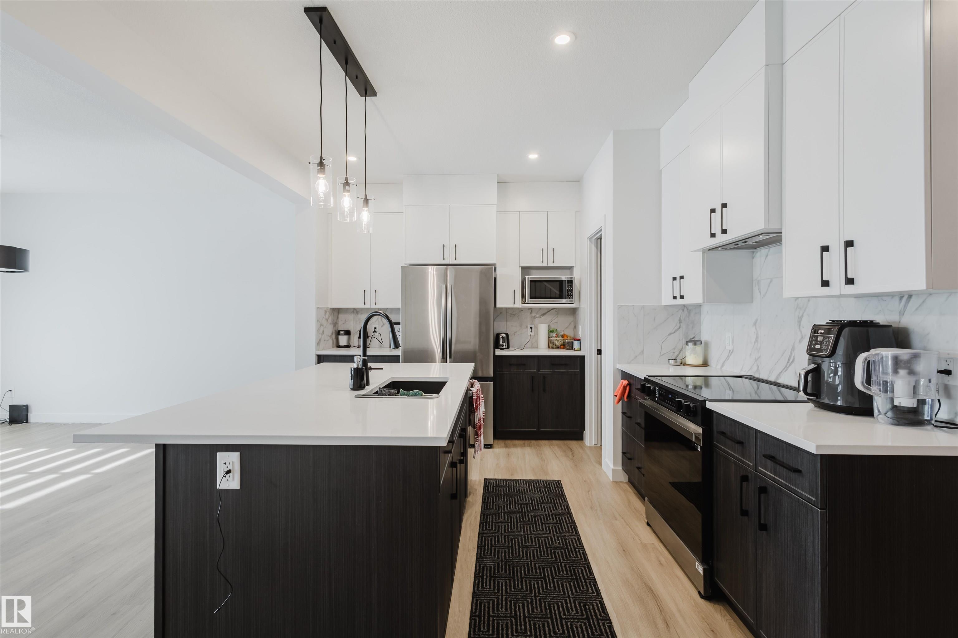 Photo 10 at 6411 27 Avenue SW, Mattson, Edmonton