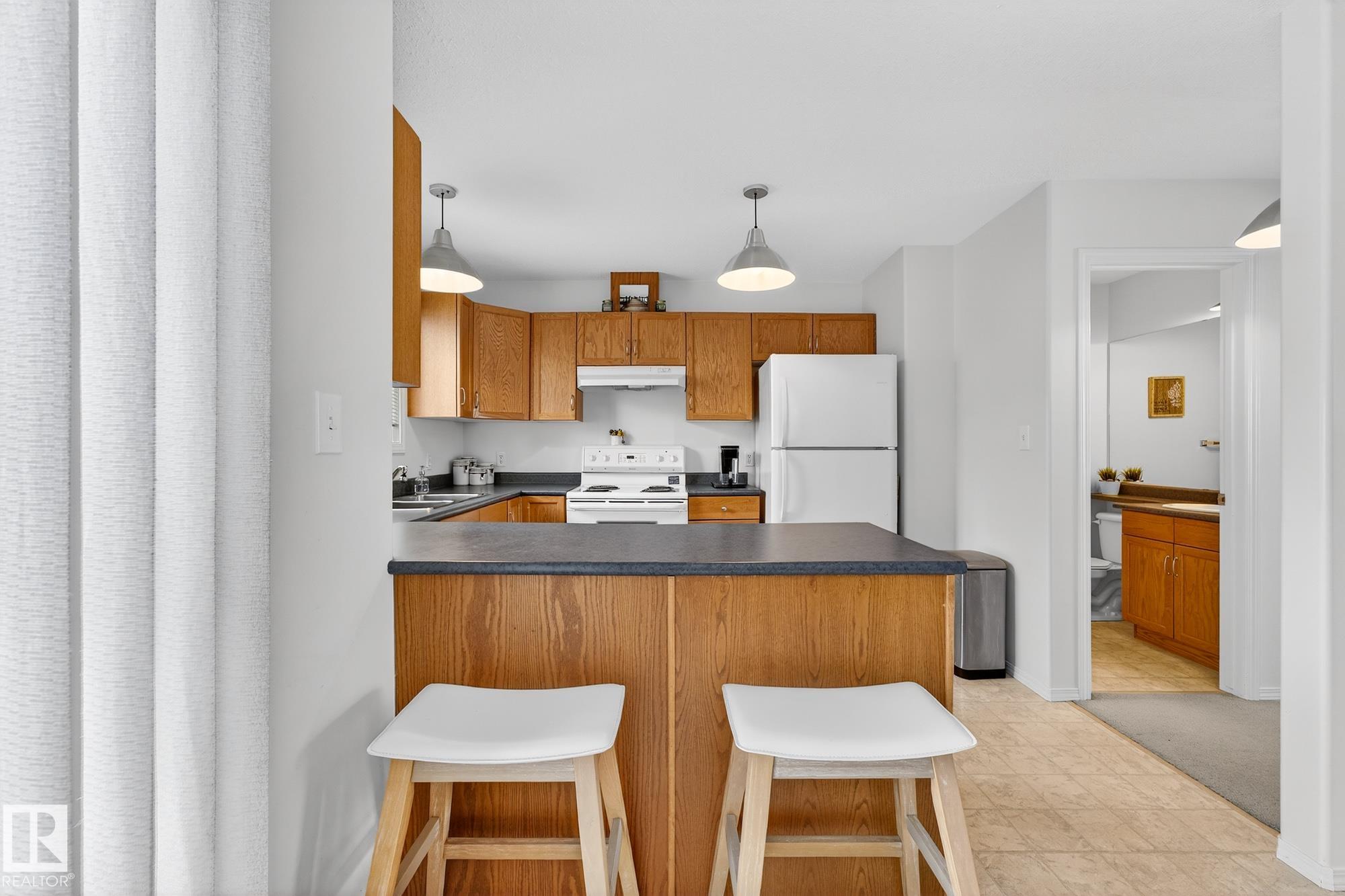 Photo 7 at 16 - 225 Blackburn Drive E SW, Blackburne, Edmonton