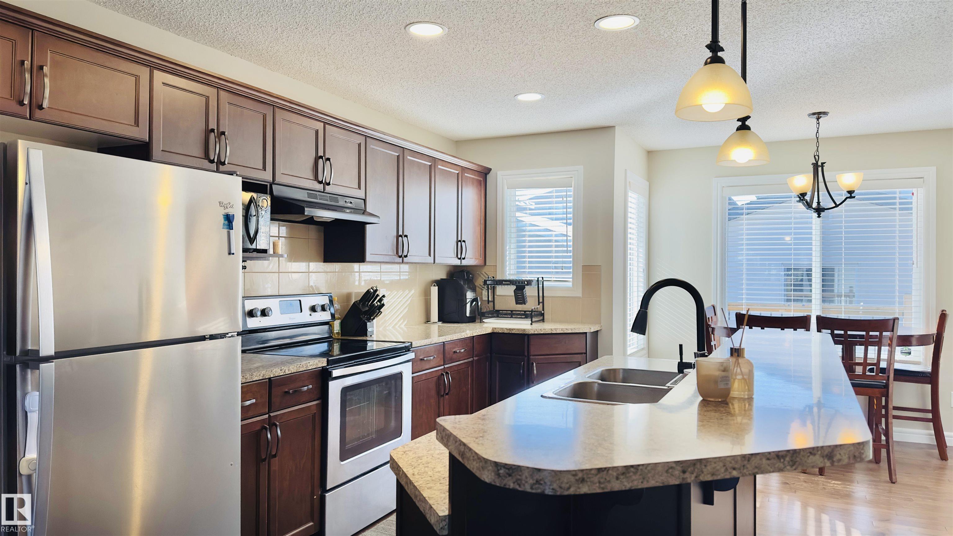 Photo 4 at 1542 33a Street NW, Laurel, Edmonton