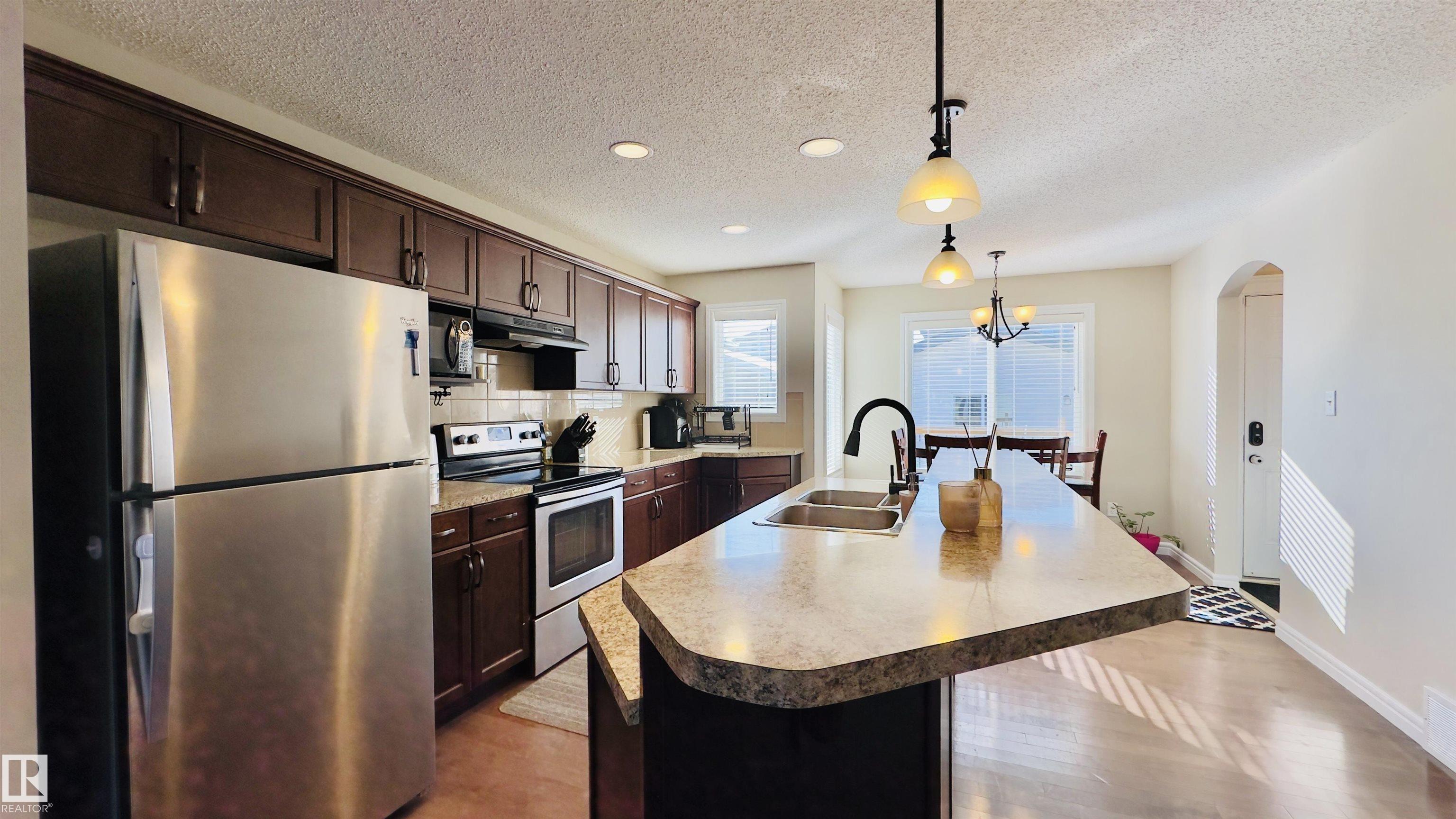 Photo 5 at 1542 33a Street NW, Laurel, Edmonton