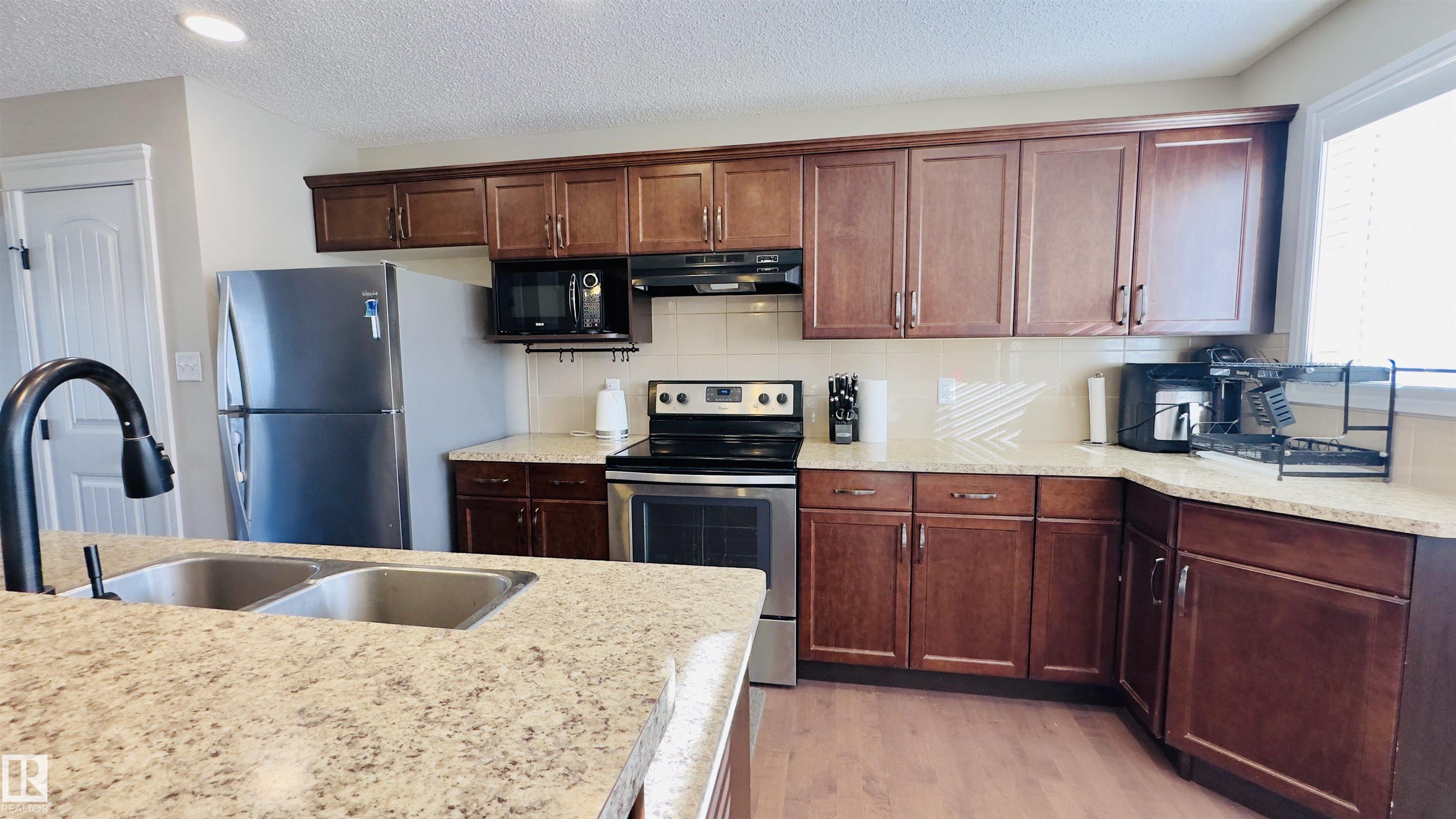 Photo 7 at 1542 33a Street NW, Laurel, Edmonton