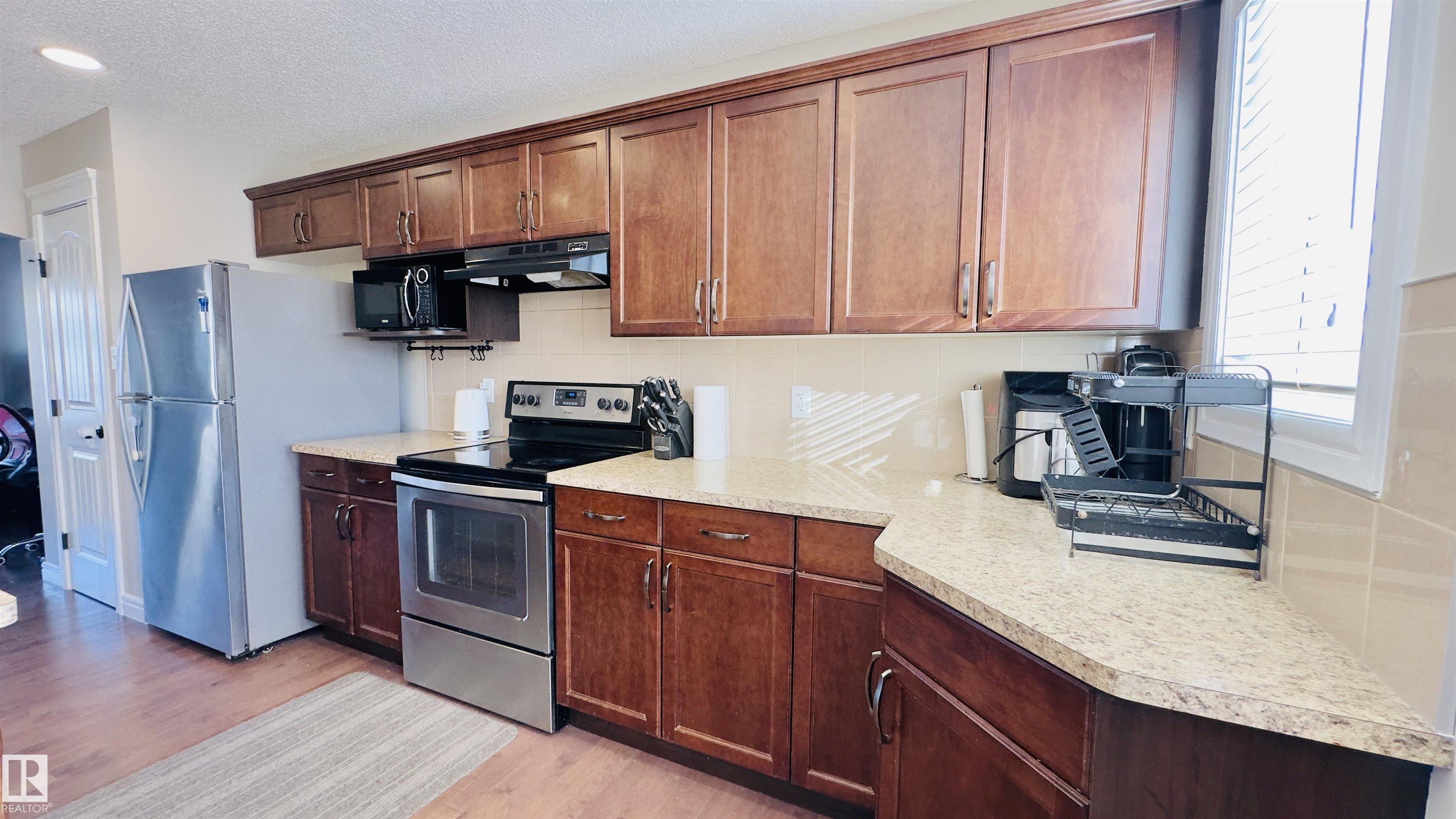 Photo 8 at 1542 33a Street NW, Laurel, Edmonton