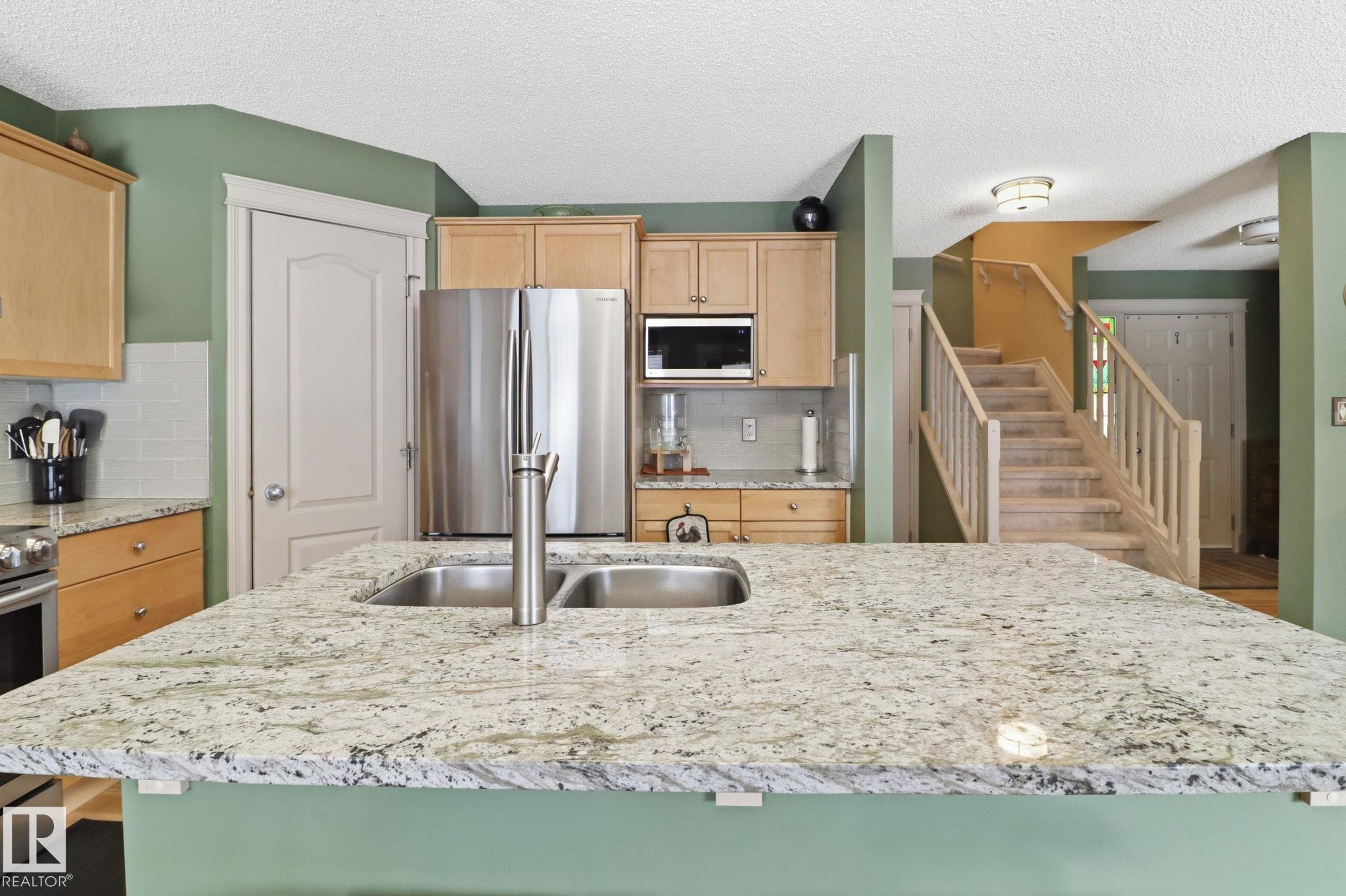 Photo 11 at 8311 11 Avenue SW, Summerside, Edmonton