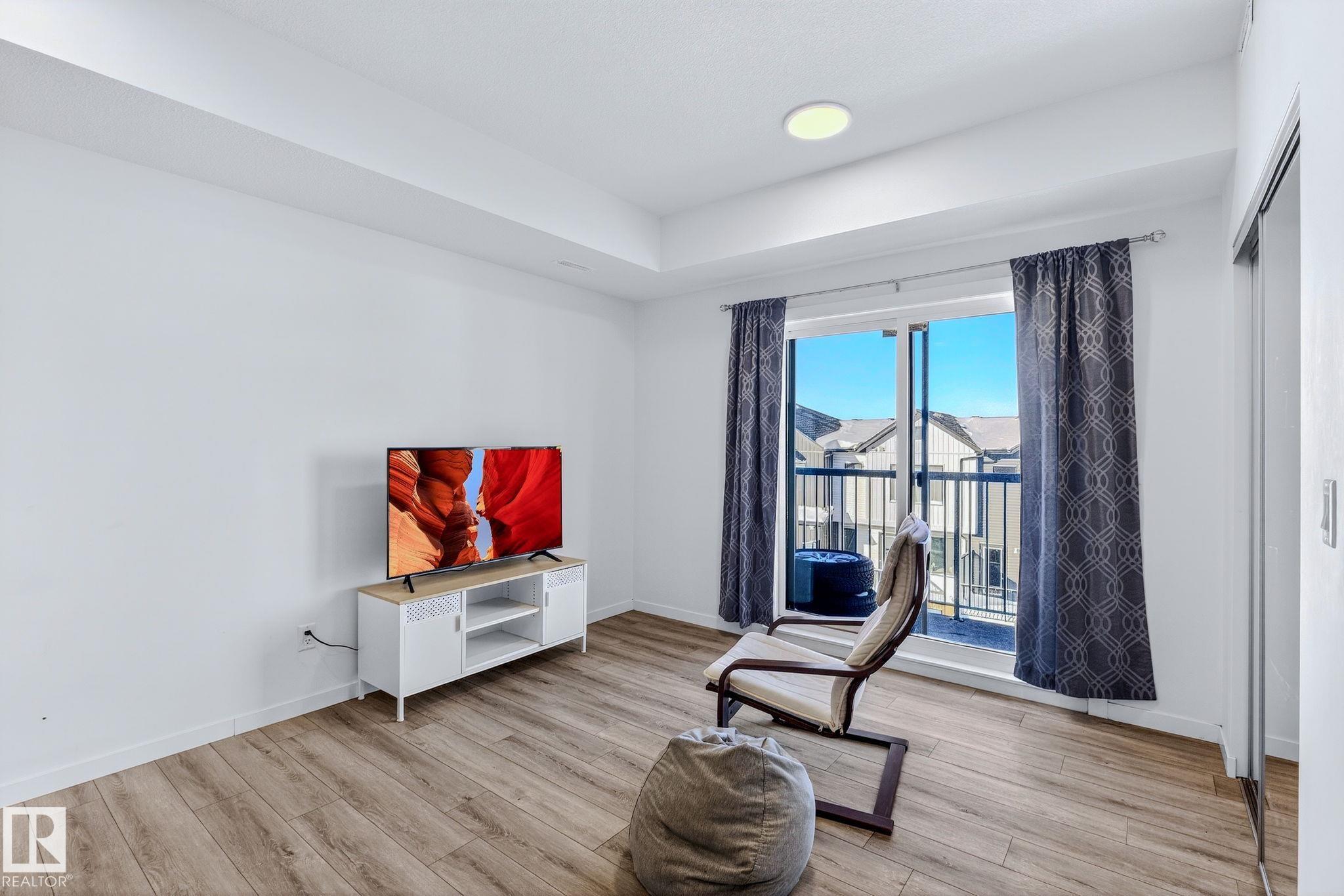 Photo 10 at 301 - 864 Secord Boulevard NW, Secord, Edmonton