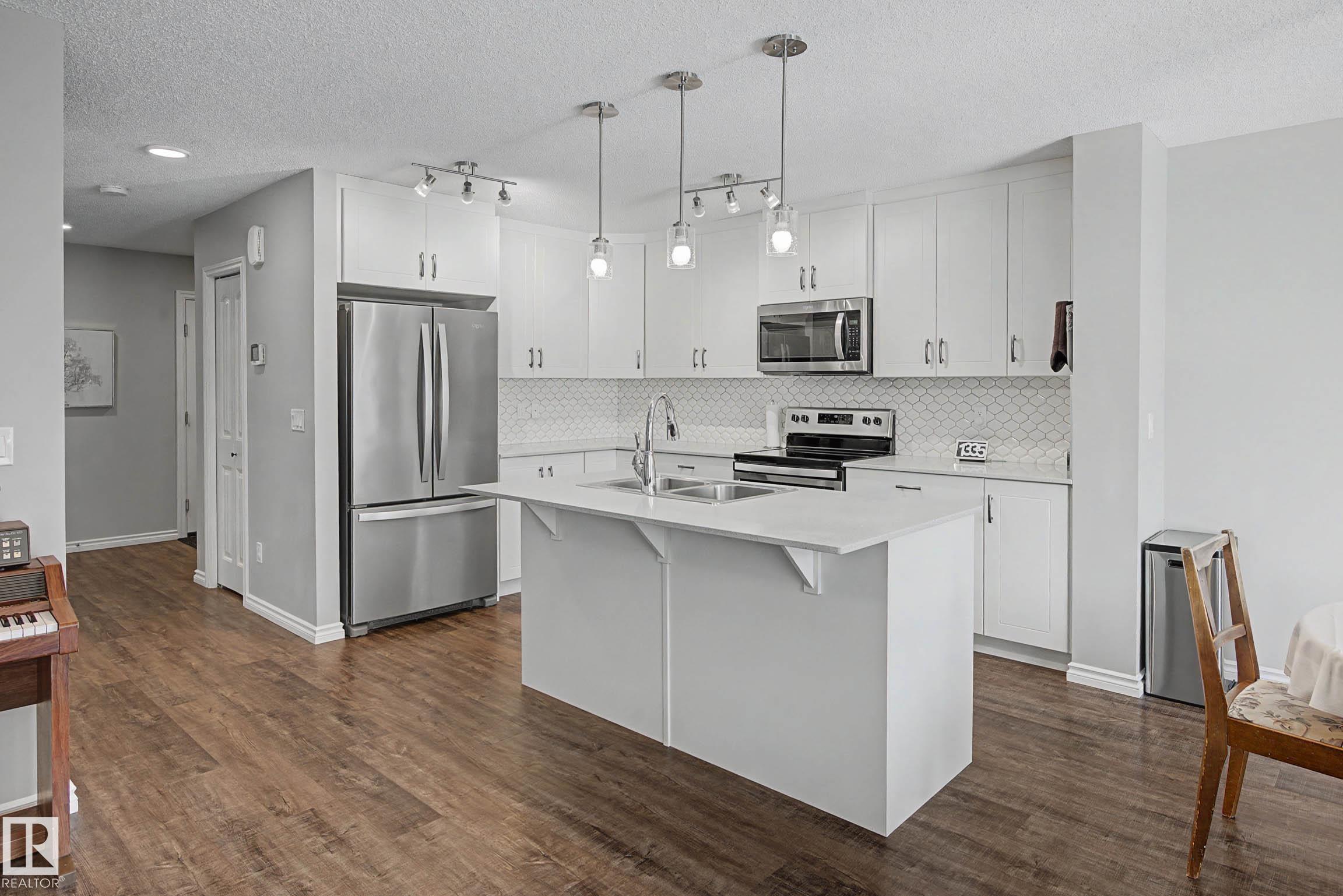 Photo 10 at 41 Robin Way, Riverside, St. Albert