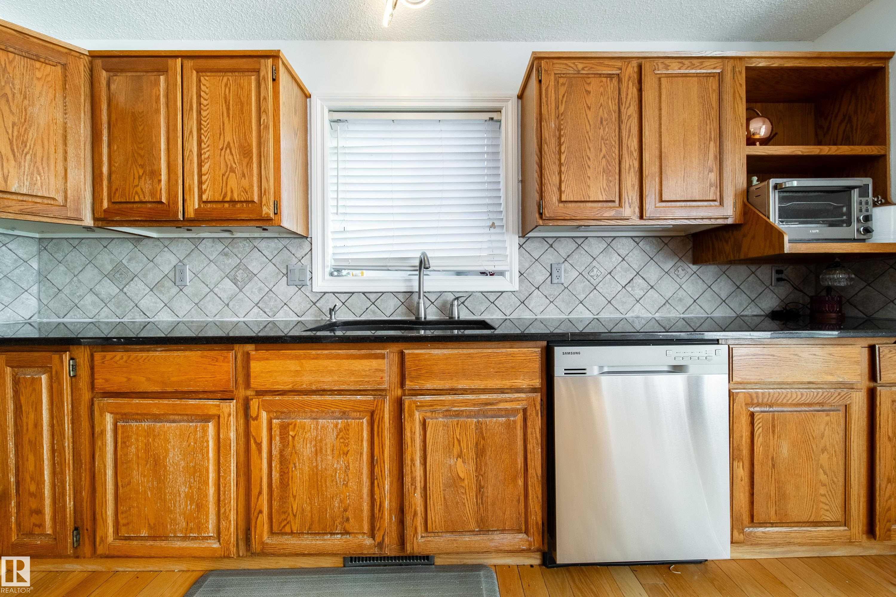 Photo 14 at 18007 57 Avenue NW, Dechene, Edmonton