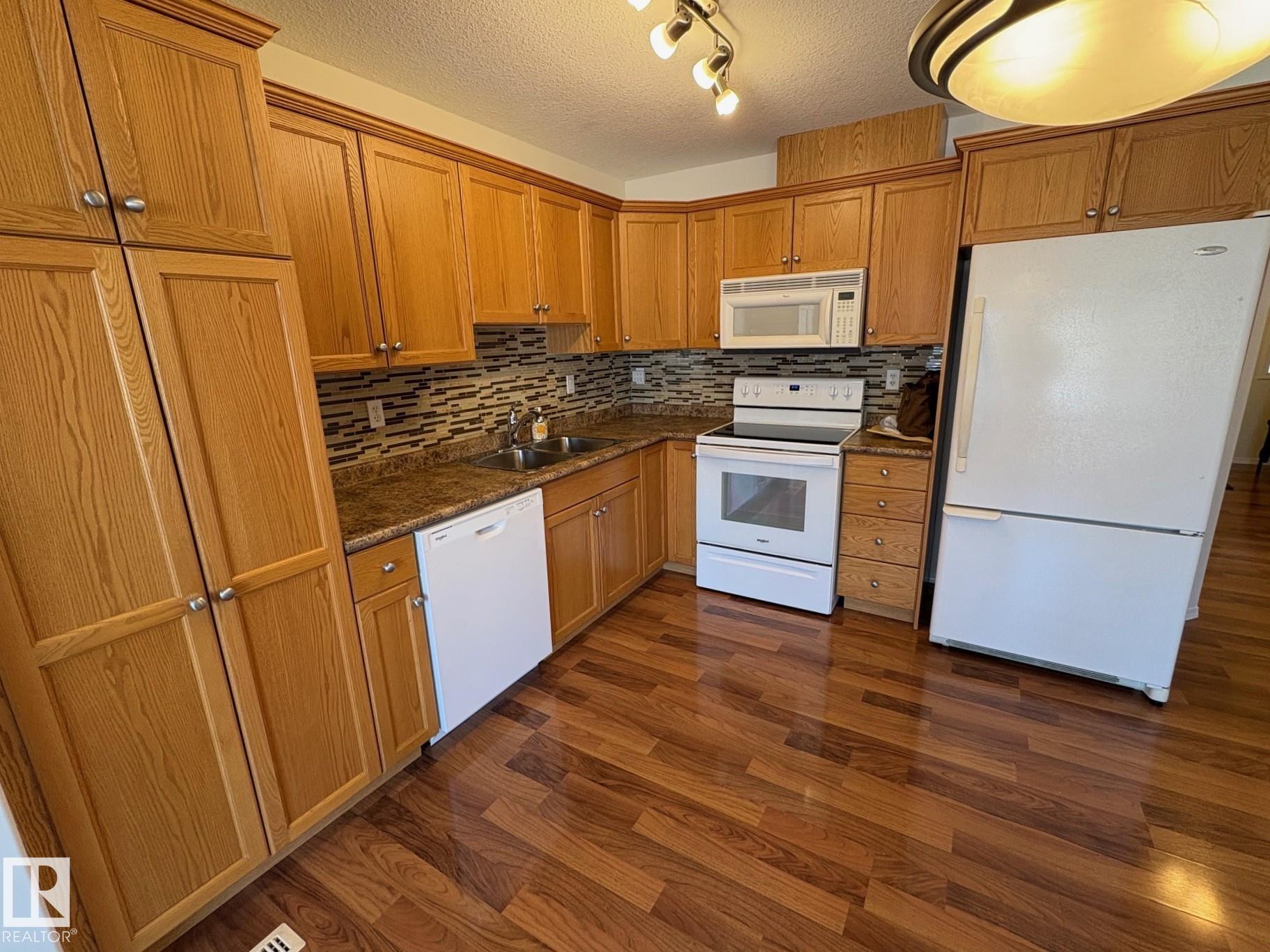 Photo 6 at 16 - 2816 34 Avenue NW, Wild Rose, Edmonton