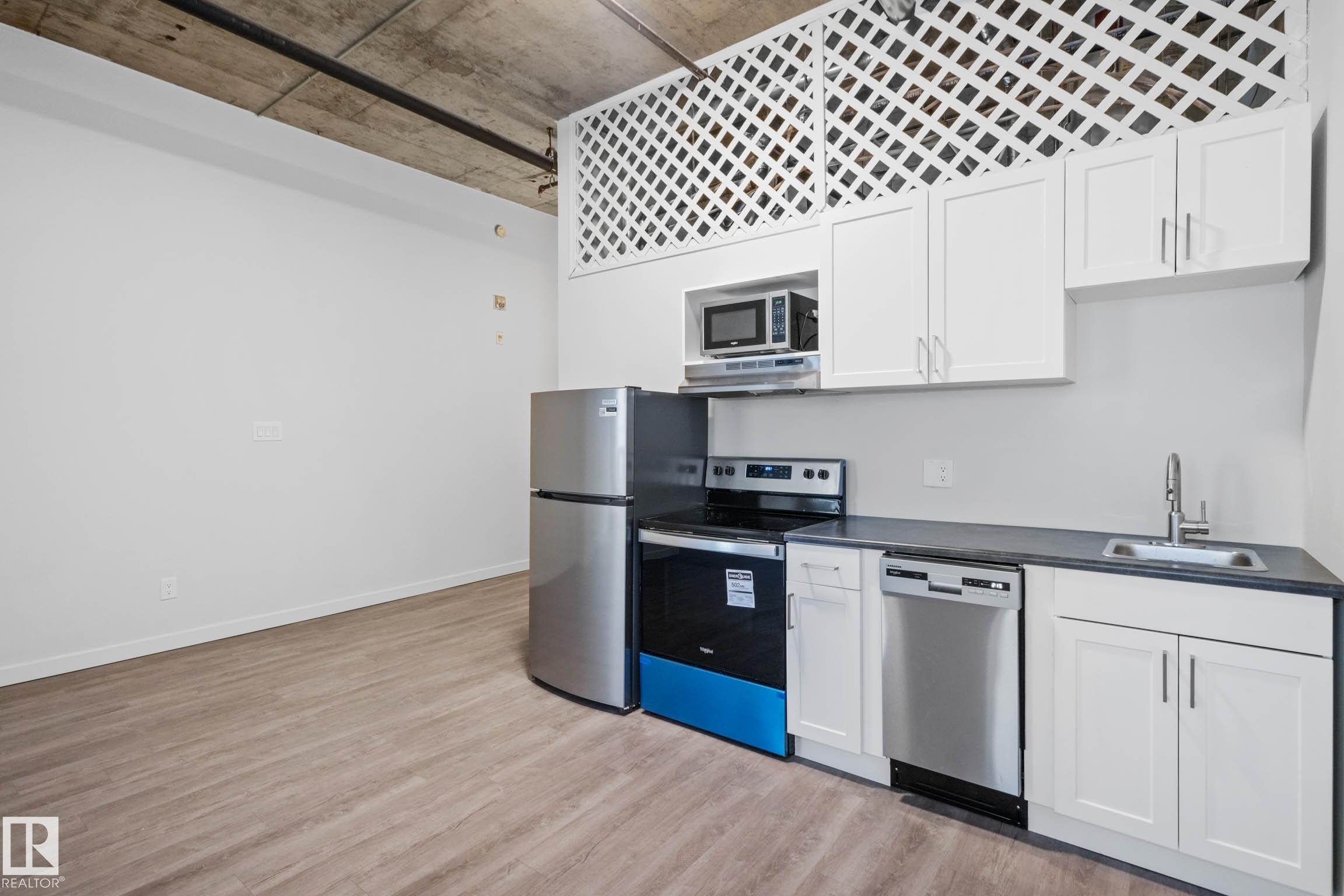 Photo 16 at 202 - 10024 Jasper Avenue NW, Downtown, Edmonton