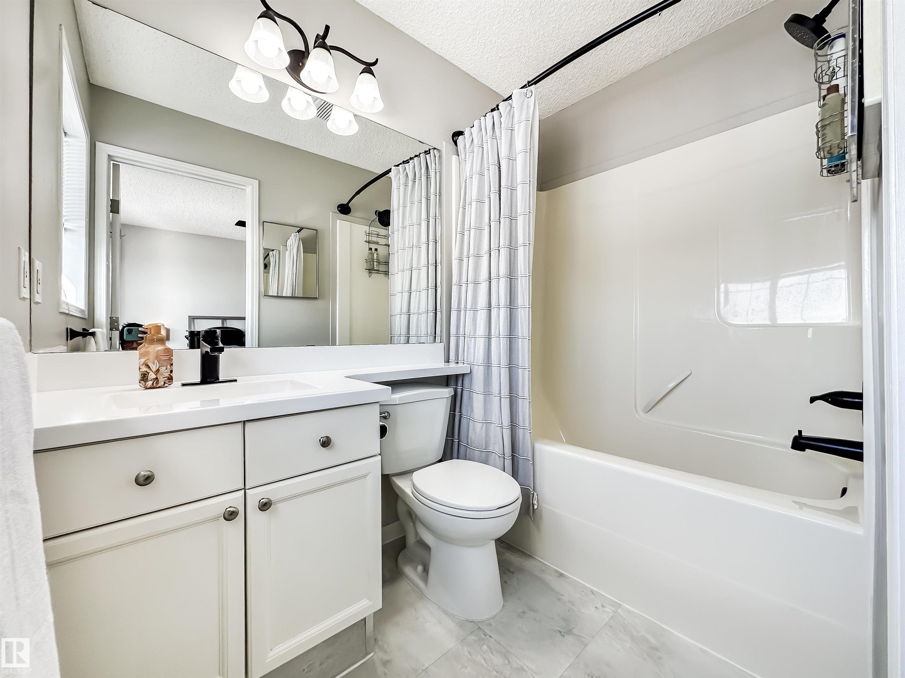 Photo 24 at 13036 139 Street NW, Athlone, Edmonton