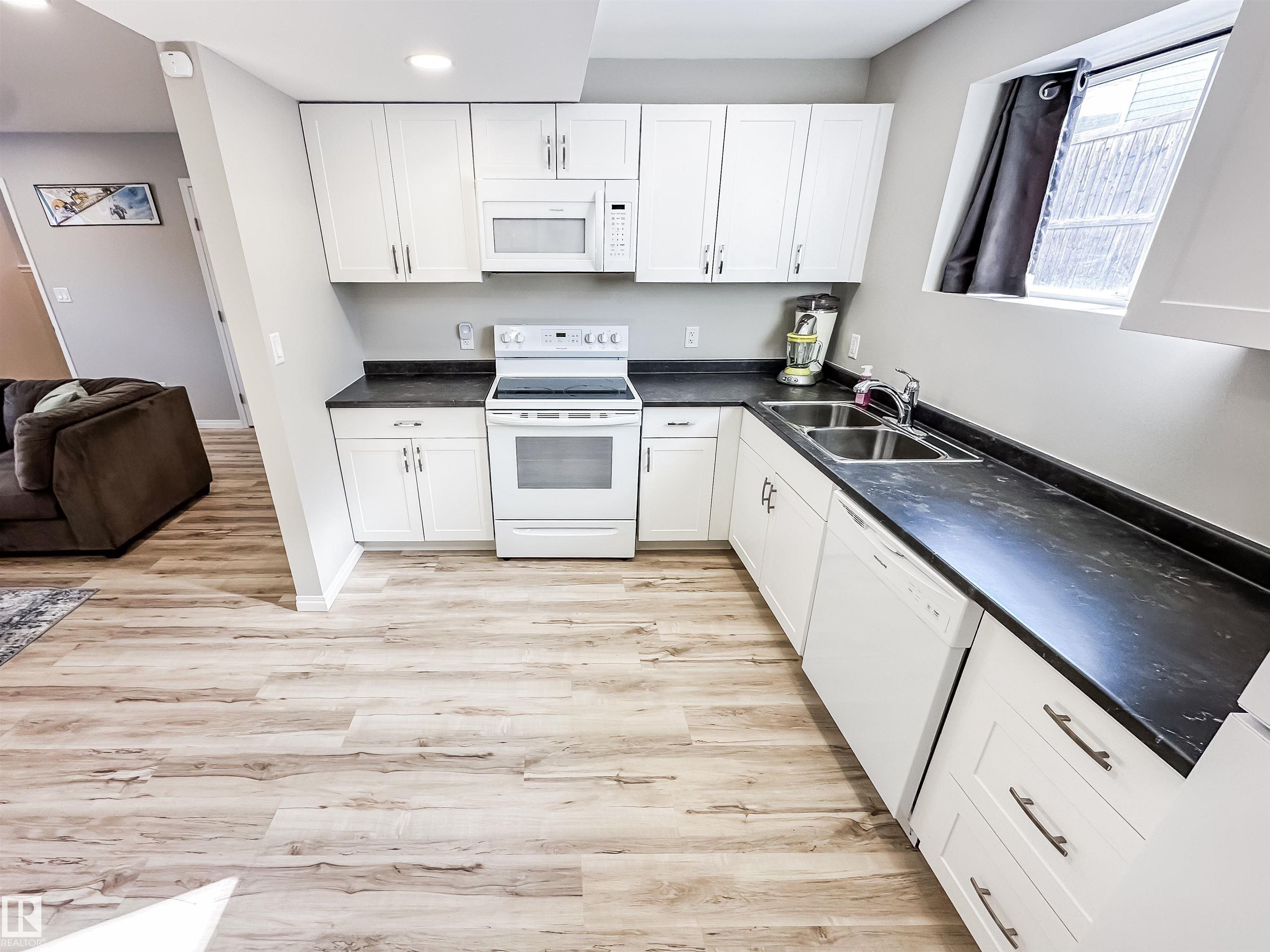 Photo 32 at 13036 139 Street NW, Athlone, Edmonton