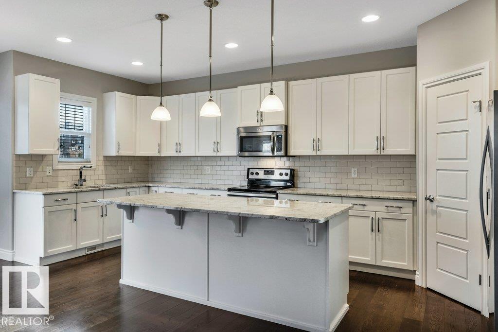 Photo 19 at 728 43 Avenue NW, Maple Crest, Edmonton