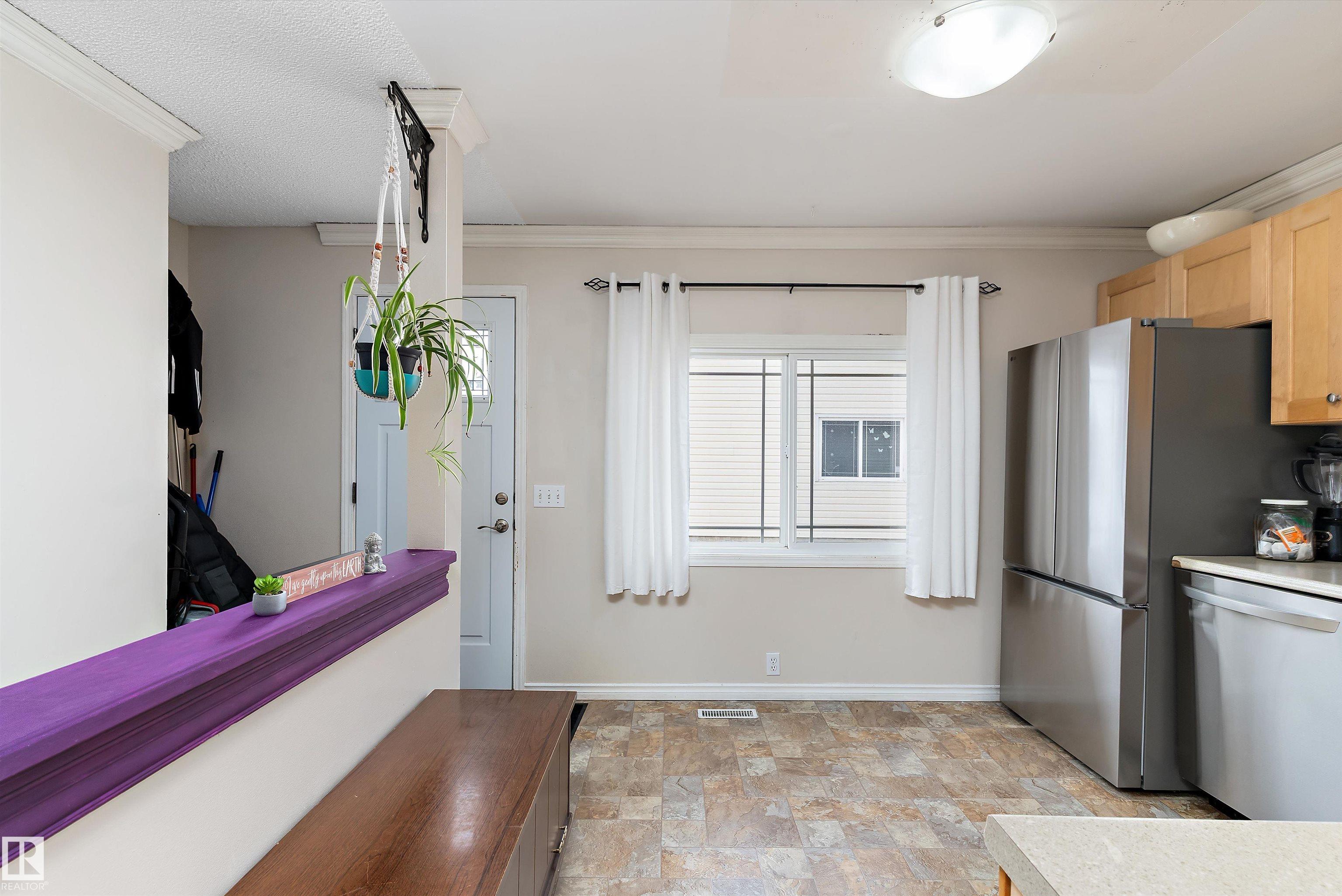 Photo 8 at 3536 12a Avenue NW, Crawford Plains, Edmonton