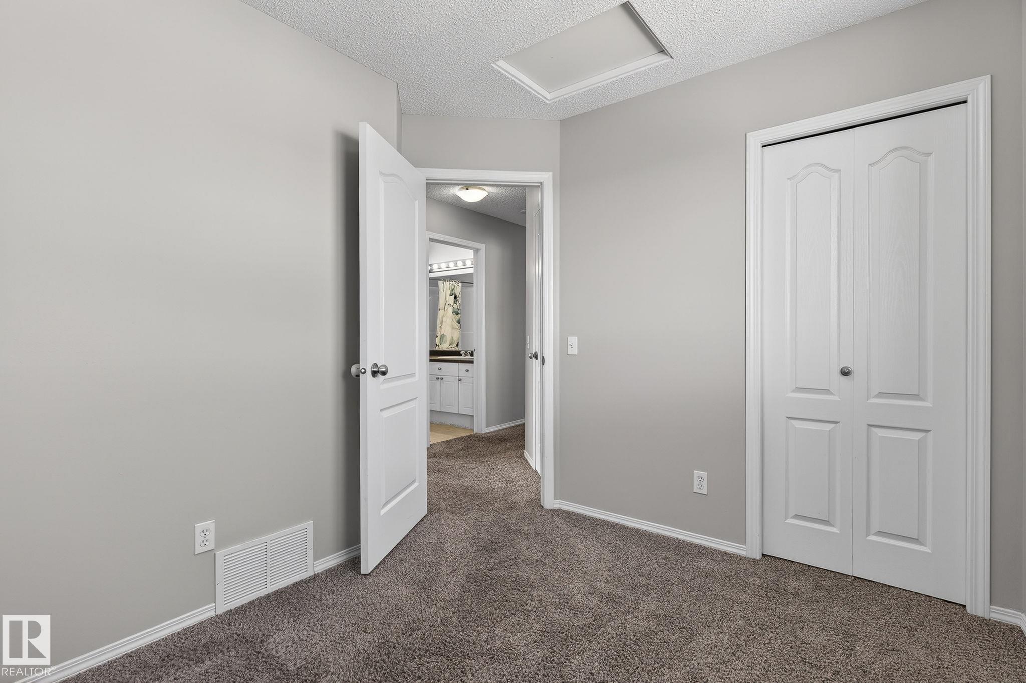 Photo 17 at 30 - 450 Hyndman Crescent NW, Canon Ridge, Edmonton