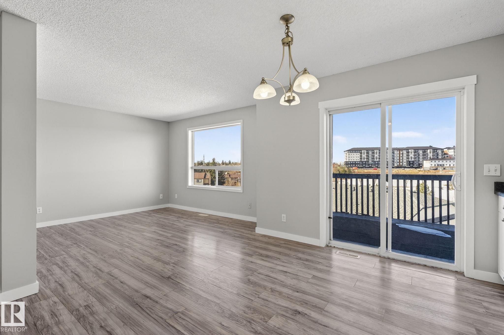 Photo 10 at 30 - 450 Hyndman Crescent NW, Canon Ridge, Edmonton
