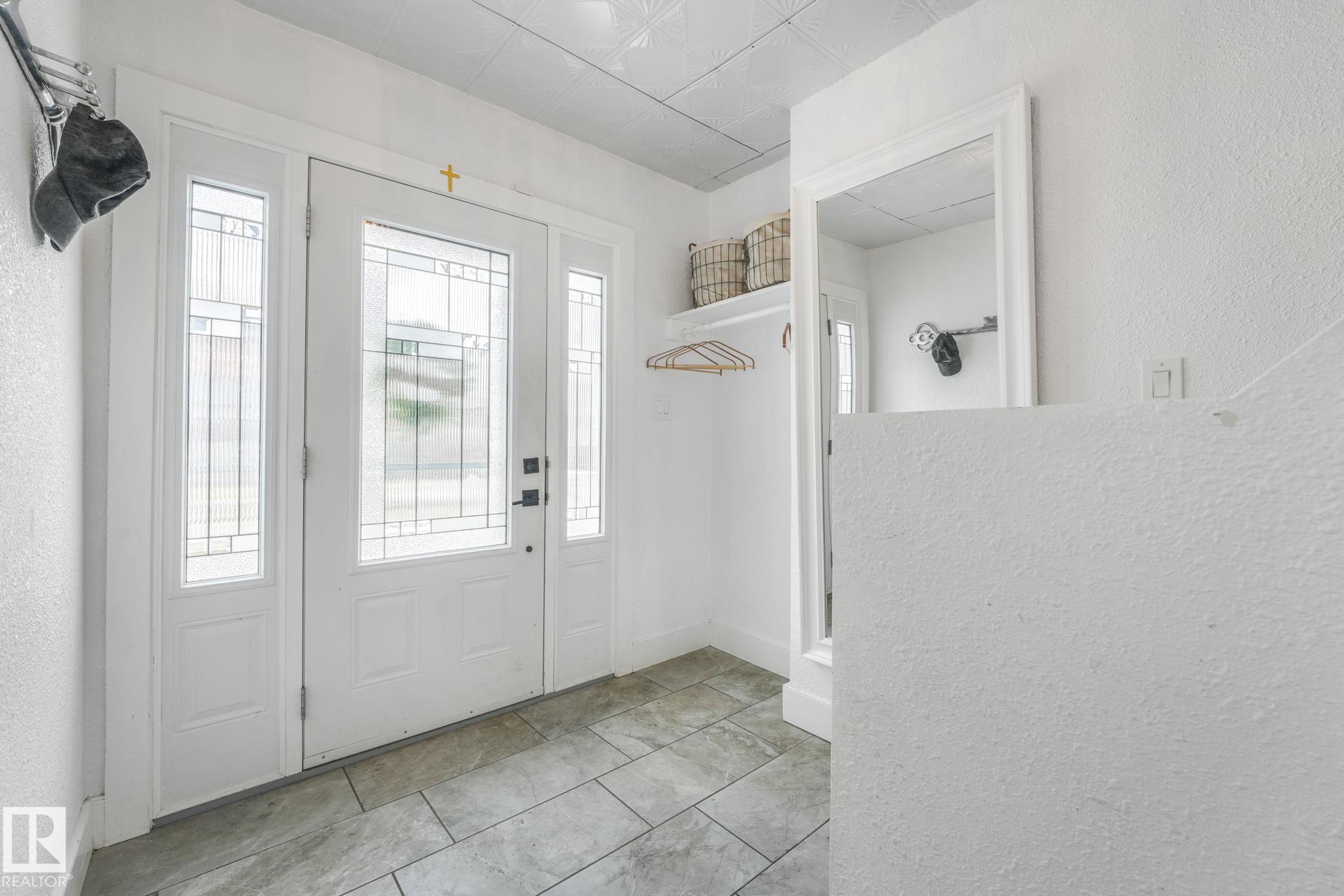 Photo 3 at 12729 108 Avenue NW, Westmount, Edmonton