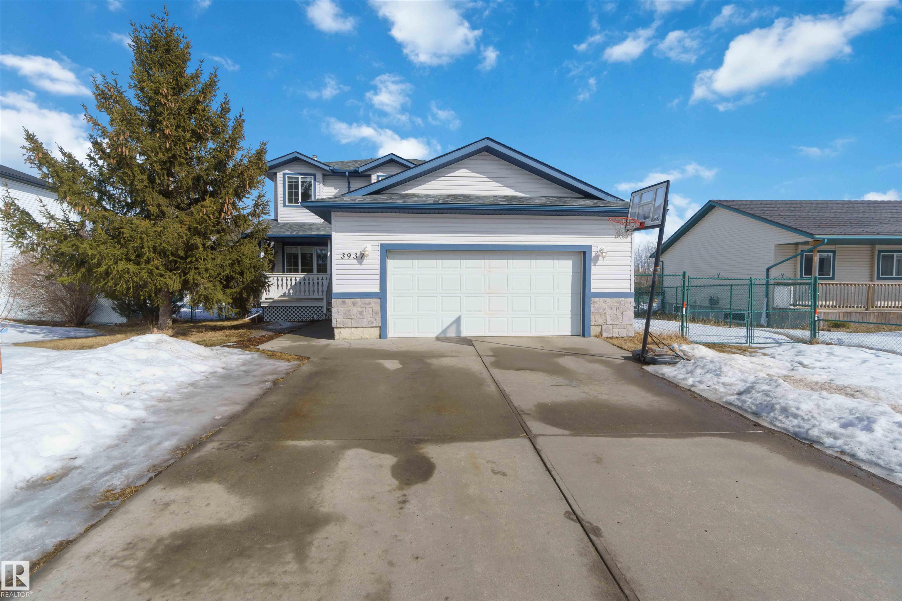 Ever dream of owning a .4-acre lot with the convenience of city water? This solid 2004-built, 1,816 sq. ft. two-storey home offers the perfect balance of massive outdoor space for the kids to play without the high maintenance of full acreage living. Featuring 5 bedrooms, two main-floor living rooms, and a fully developed basement with an additional rec room, there is space for everyone. The home is topped with a new roof (2024) and features a bright, west-facing layout. Outside, you?ll find a large garden, numerous fruit trees, a shed, and a deck with a gas BBQ hookup. The property includes a double attached garage and ample parking for an RV. Perfectly situated for convenience, you are walking distance to the elementary school and just 15 minutes from CFB Edmonton. This is a rare opportunity to secure a spacious family home on a prime, oversized lot.