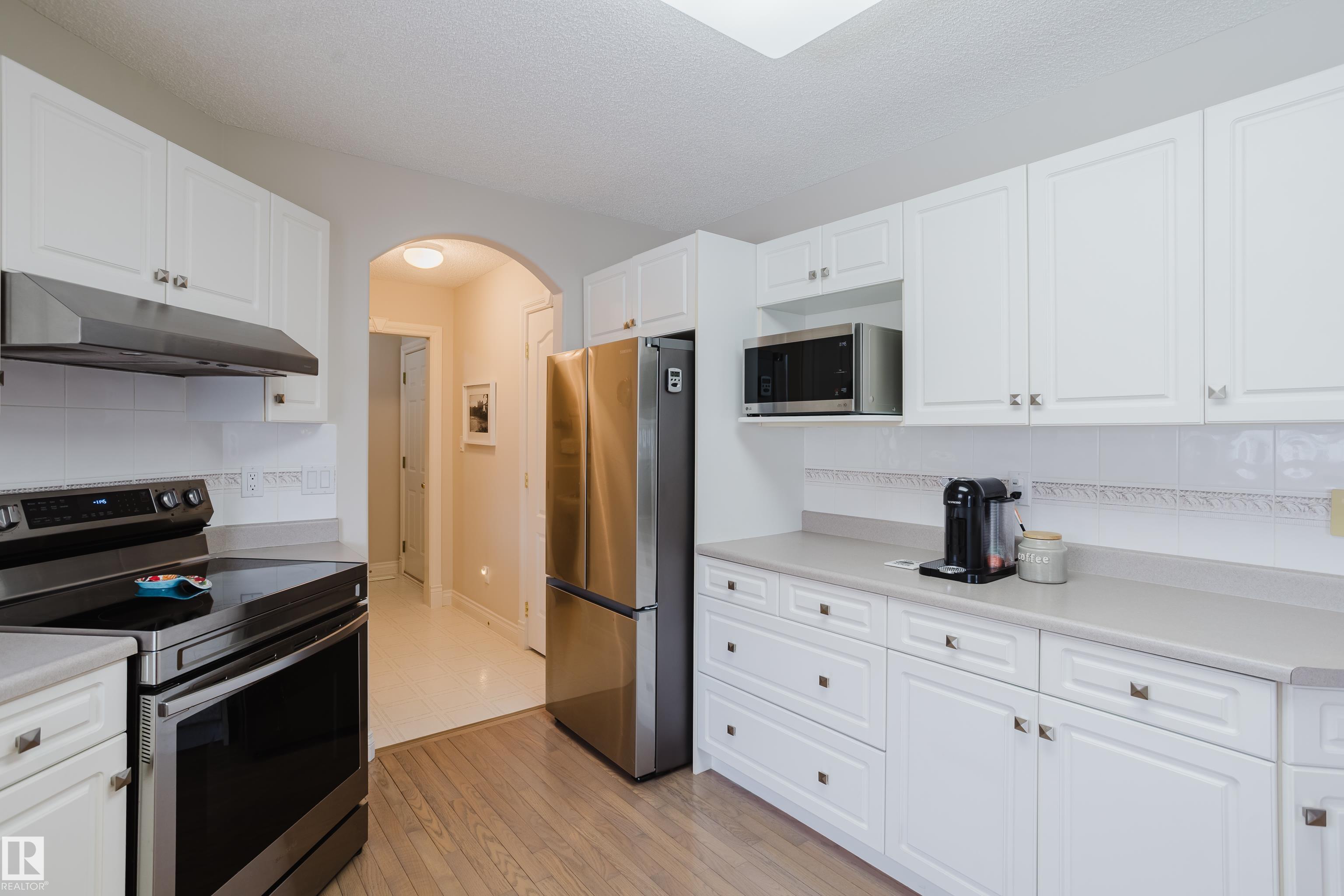 Photo 15 at 11660 15 Avenue NW, Twin Brooks, Edmonton