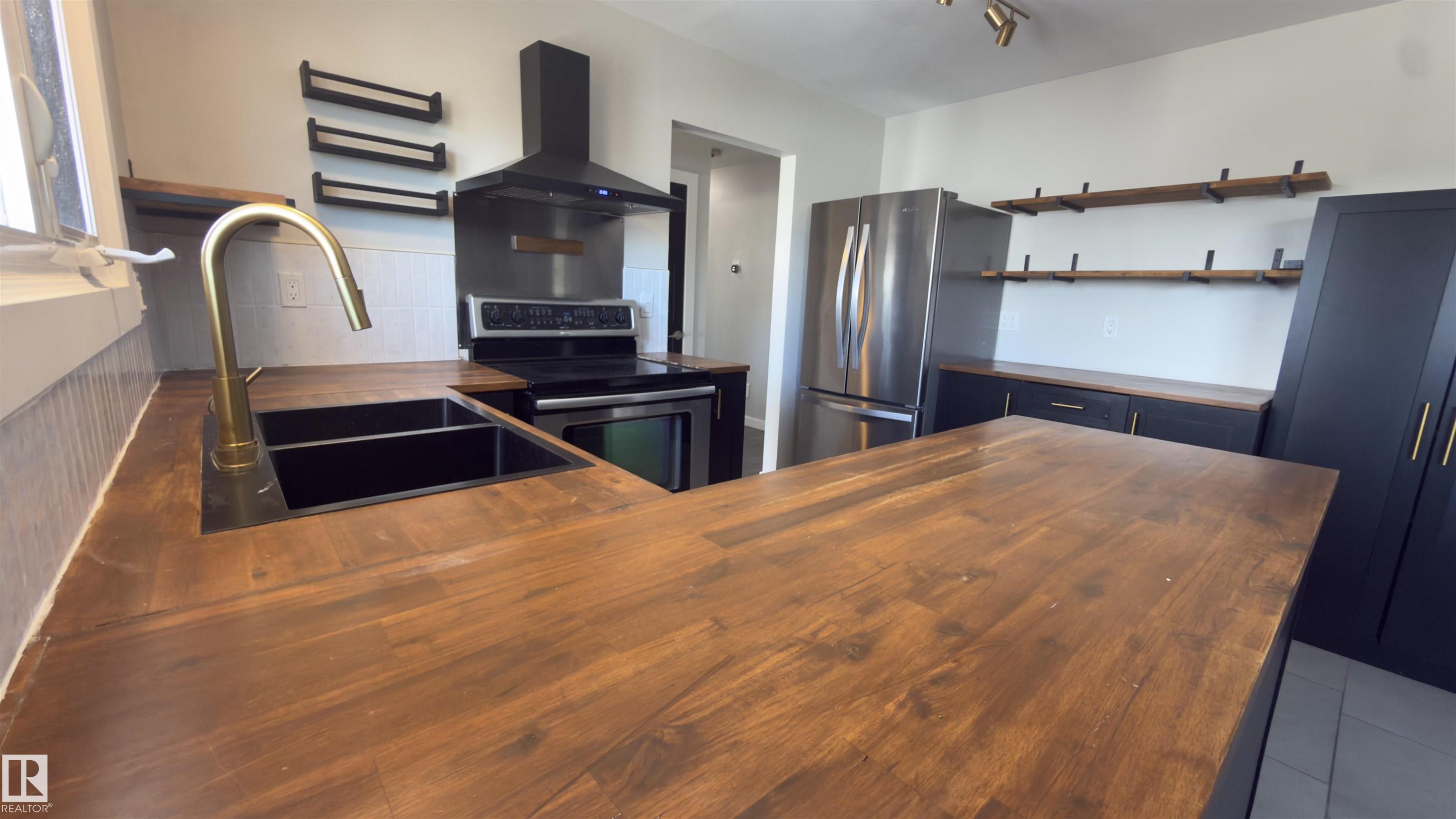 Photo 19 at 12121 38 Street NW, Beacon Heights, Edmonton