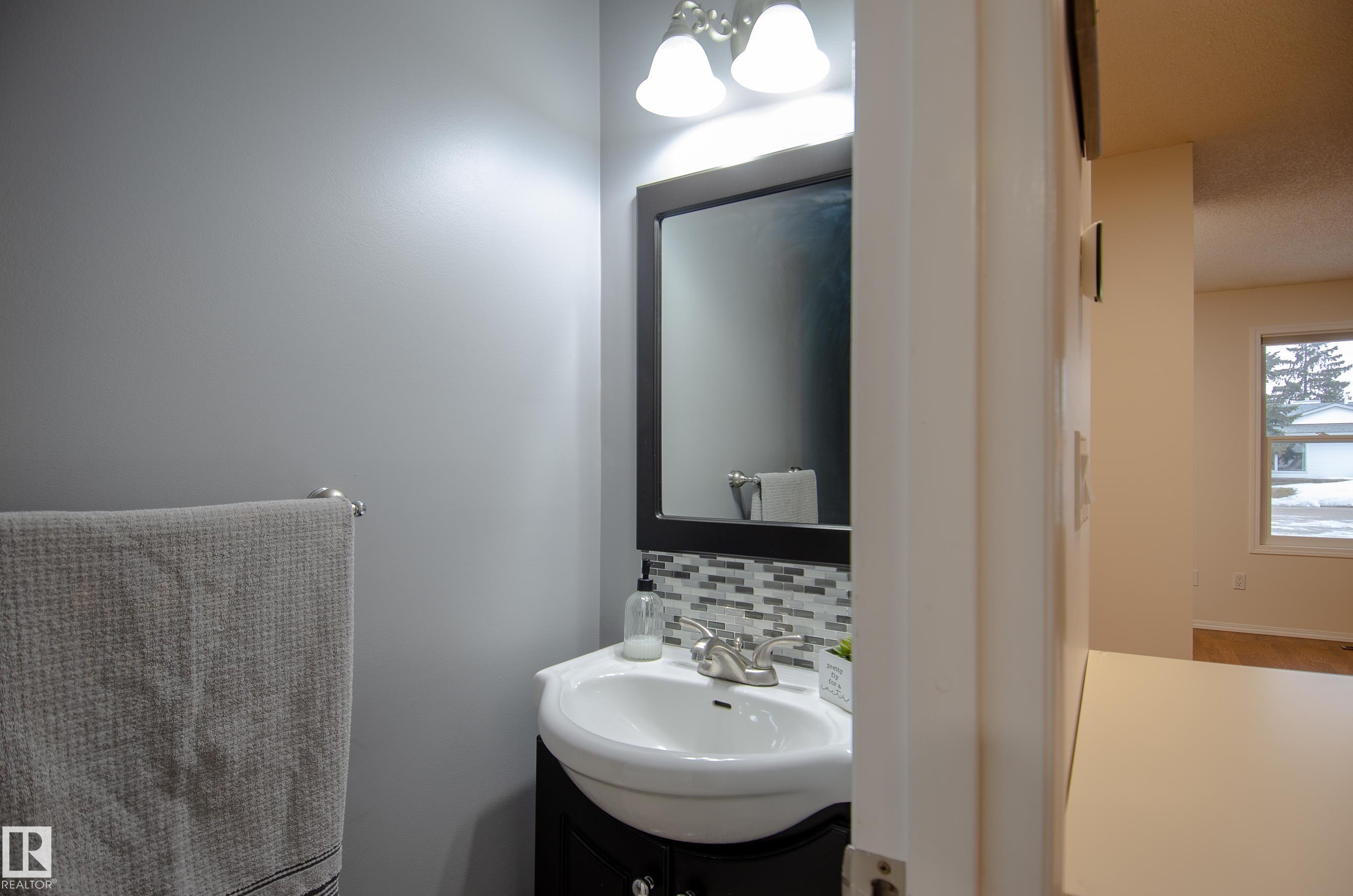 Photo 11 at 3516 13 Avenue NW, Crawford Plains, Edmonton