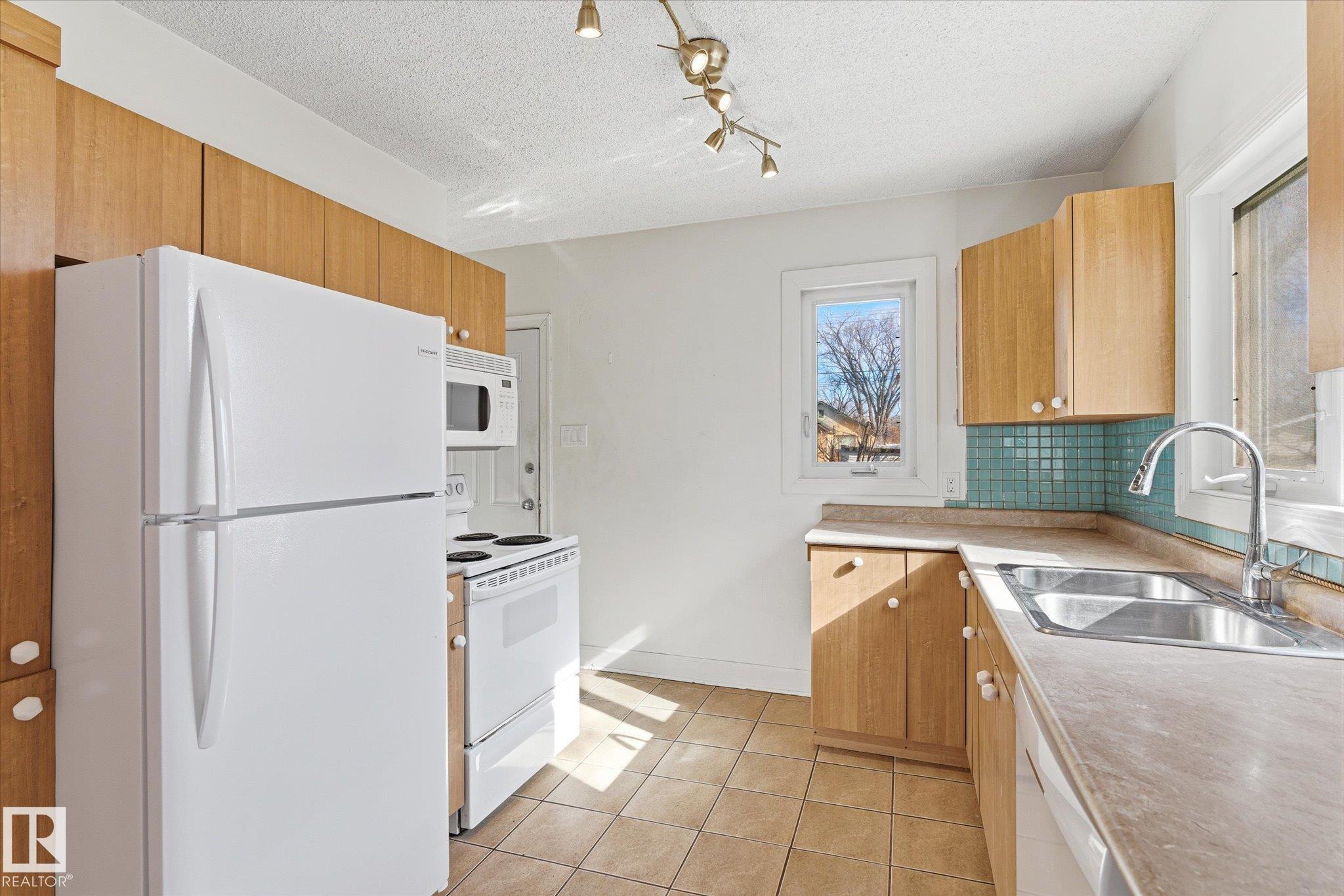 Photo 10 at 12821 122 Street NW, Calder, Edmonton