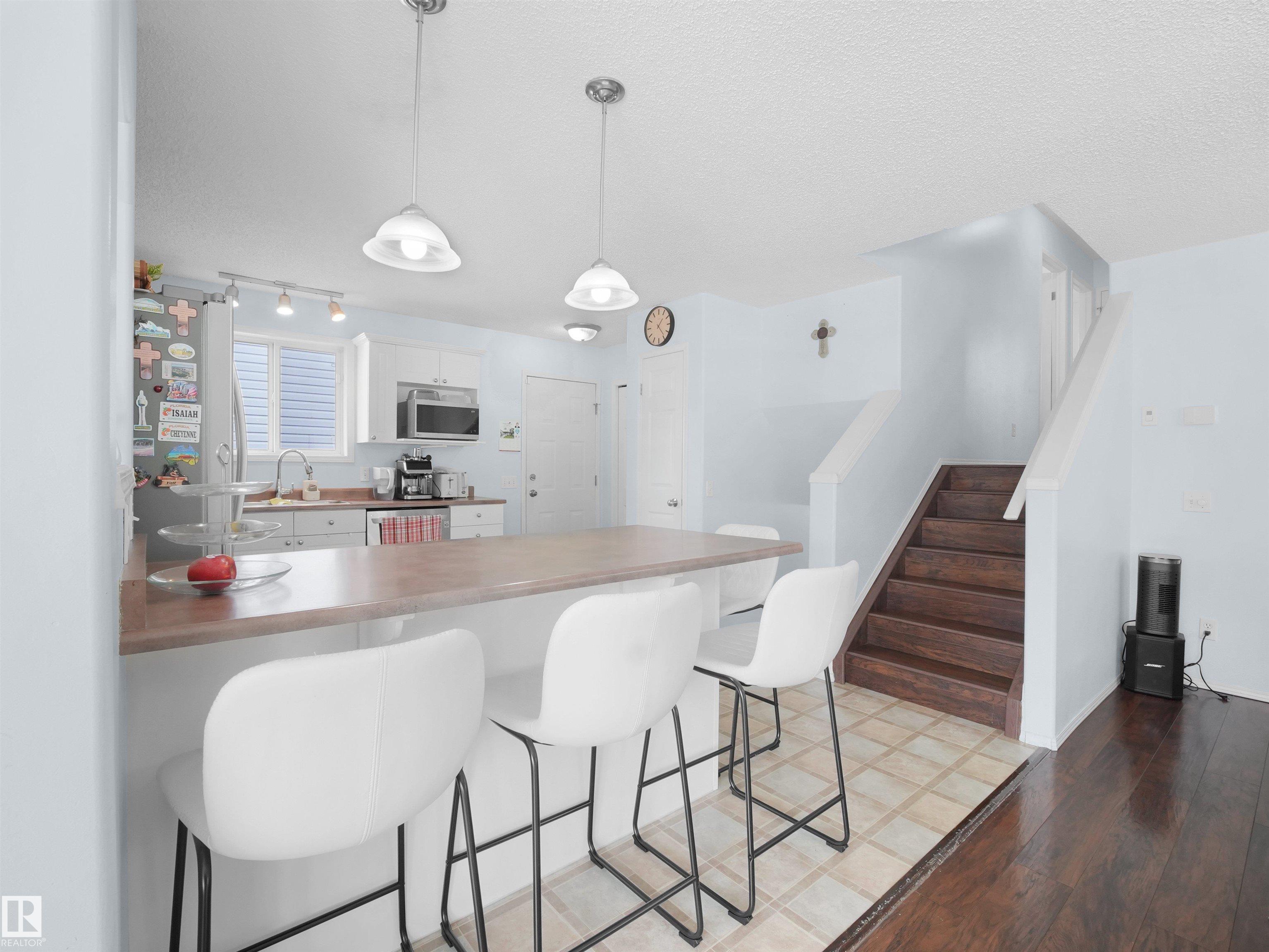 Photo 8 at 13040 34 Street NW, Belmont, Edmonton