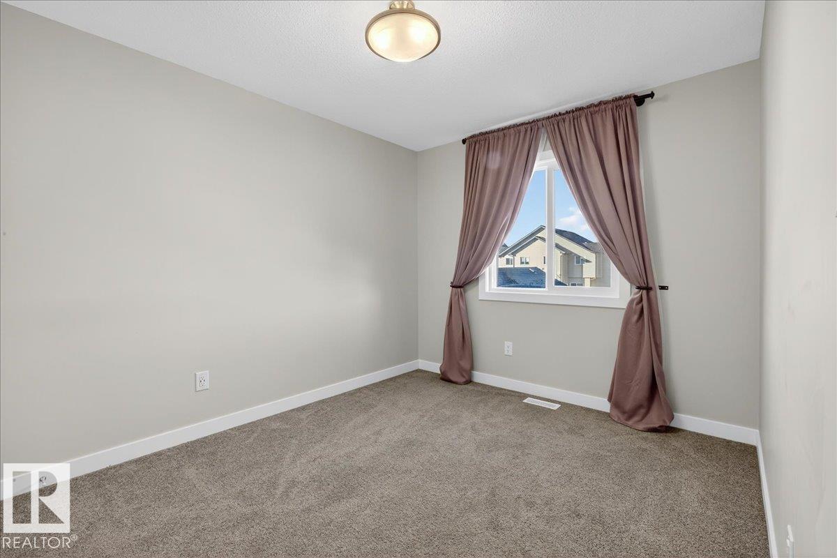 Photo 30 at 9876 206 Street NW, Stewart Greens, Edmonton