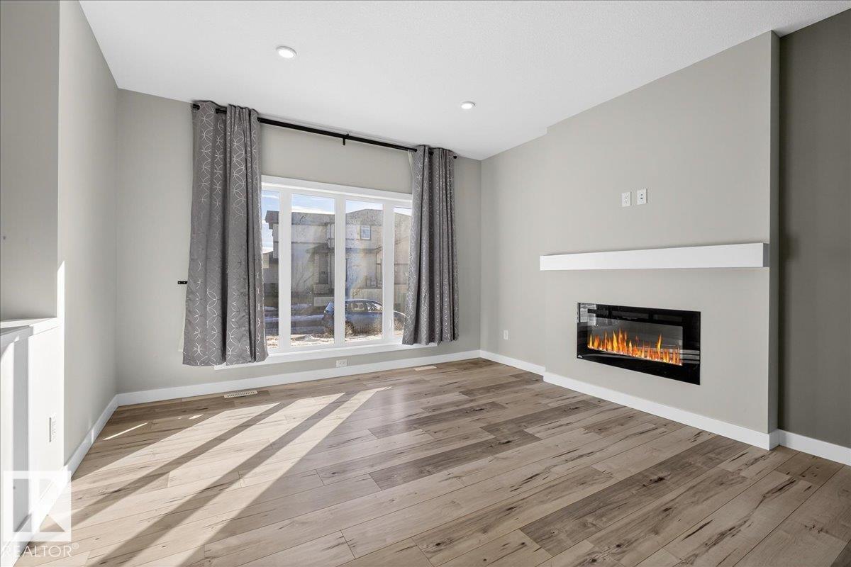 Photo 9 at 9876 206 Street NW, Stewart Greens, Edmonton