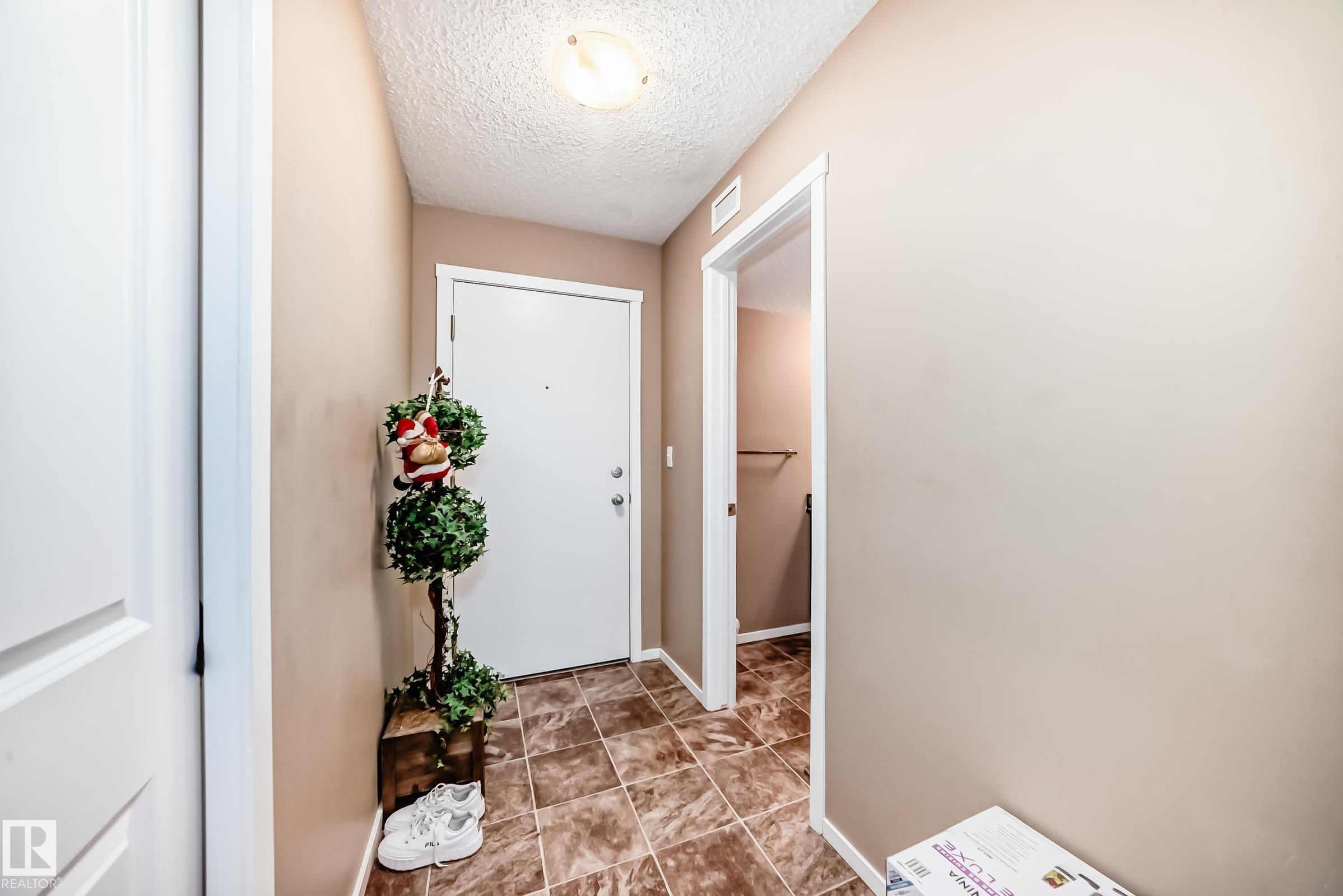 Photo 2 at 116 - 5810 Mullen Place NW, MacTaggart, Edmonton