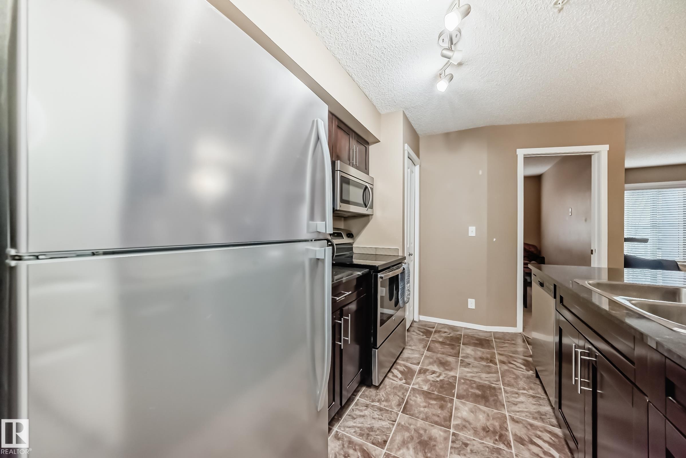 Photo 9 at 116 - 5810 Mullen Place NW, MacTaggart, Edmonton