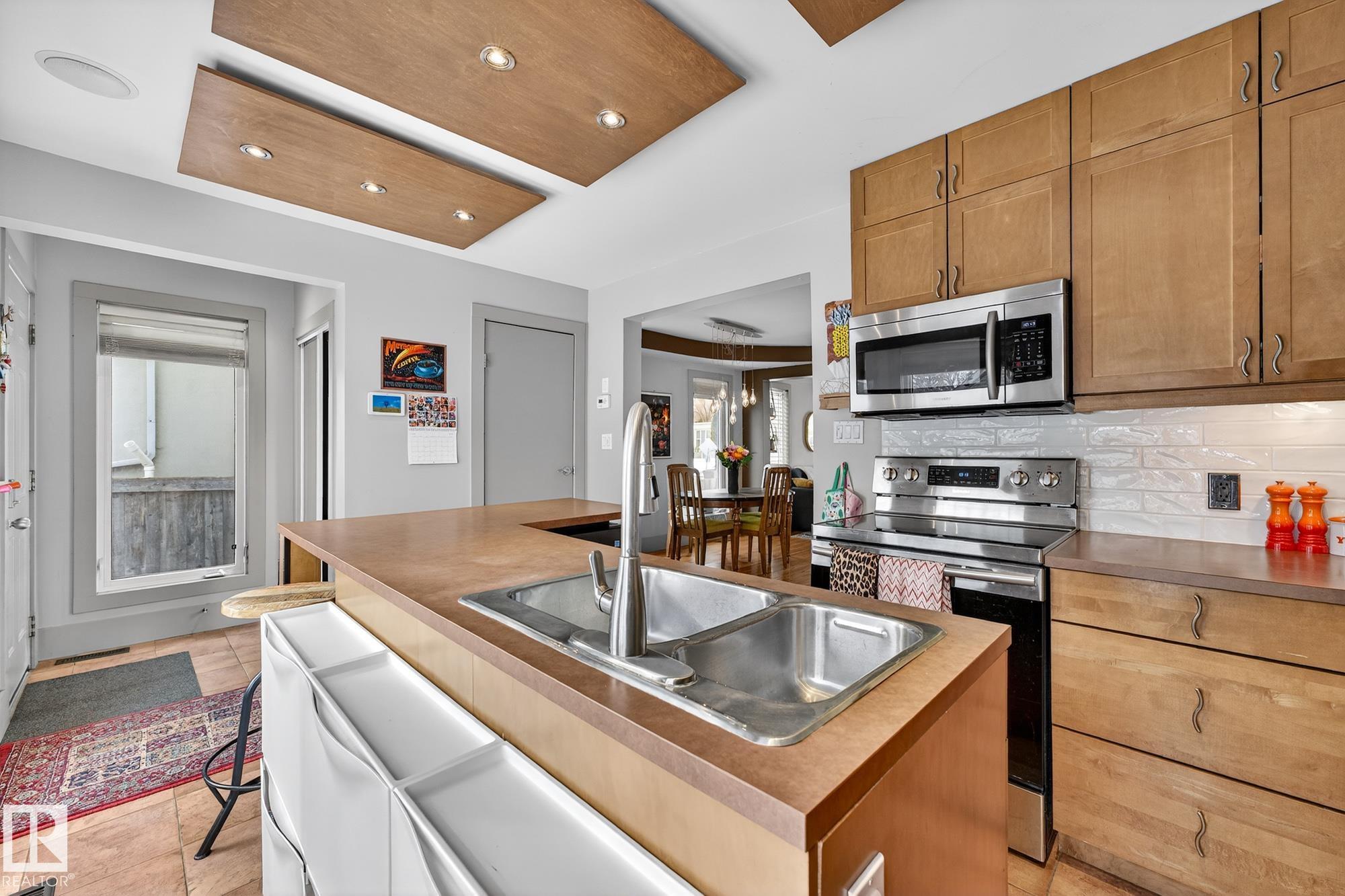 Photo 15 at 11343 67 Street NW, Highlands, Edmonton