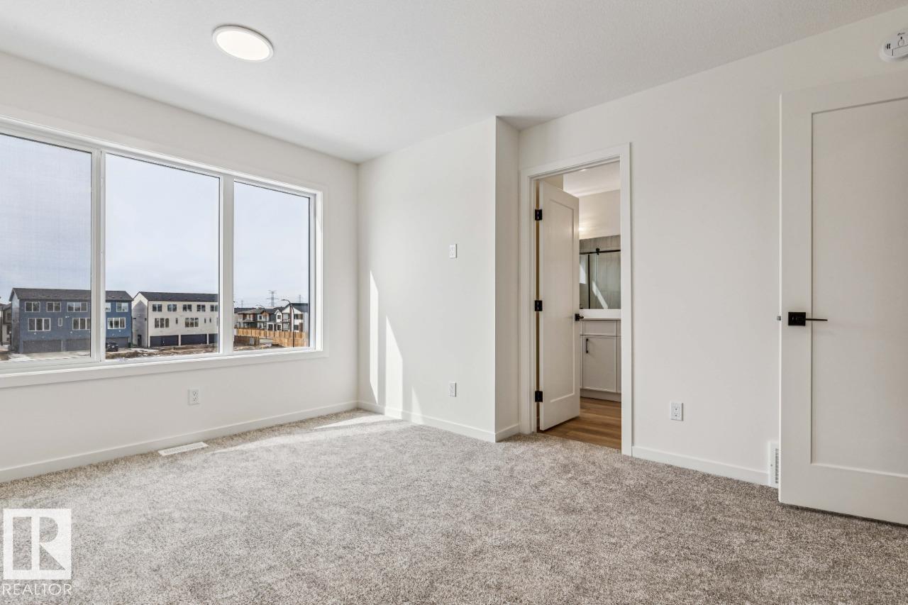 Photo 16 at 324 30 Street SW, Alces, Edmonton