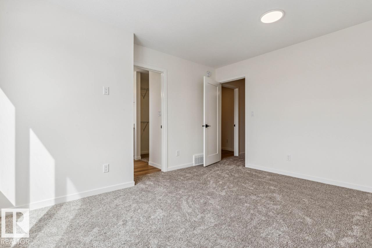 Photo 17 at 324 30 Street SW, Alces, Edmonton