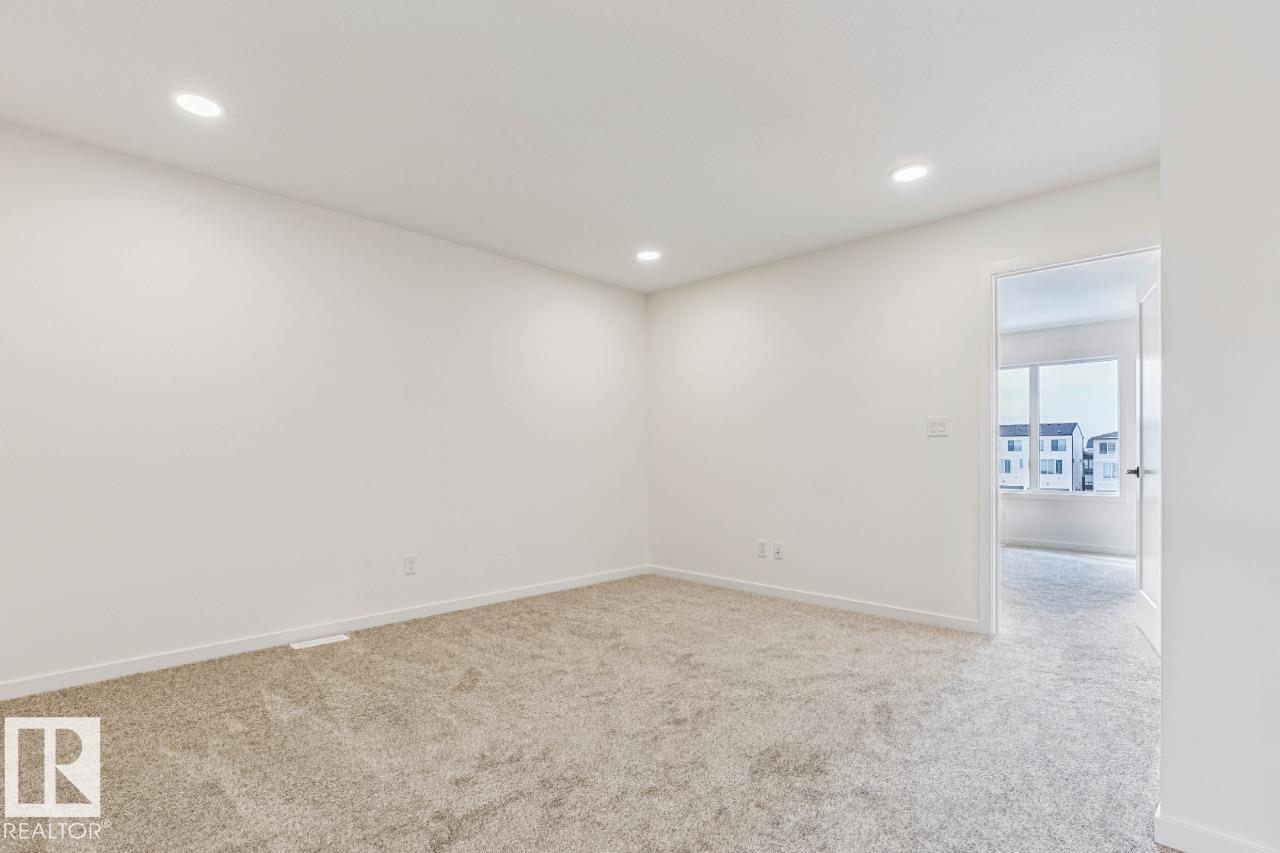 Photo 25 at 324 30 Street SW, Alces, Edmonton