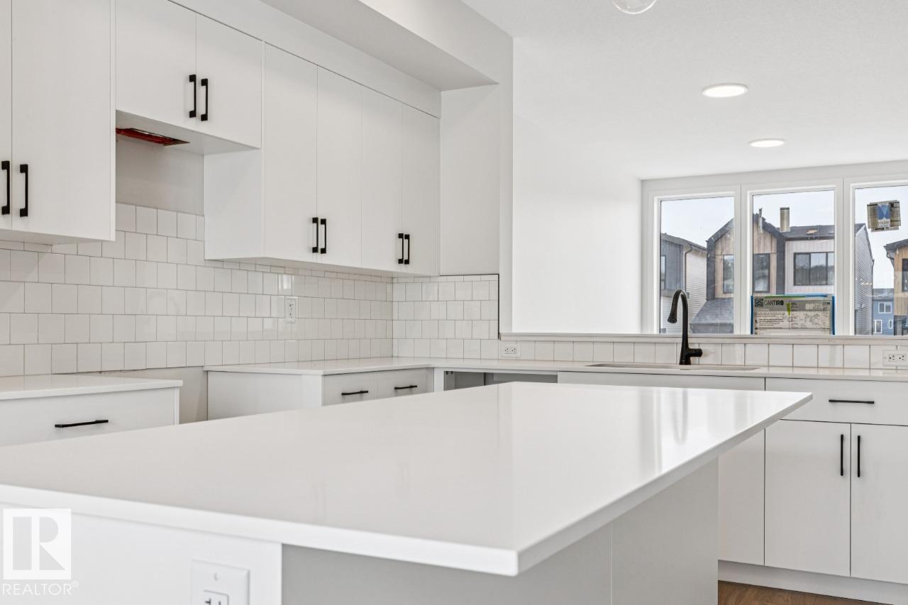 Photo 11 at 319 30 Street SW, Alces, Edmonton