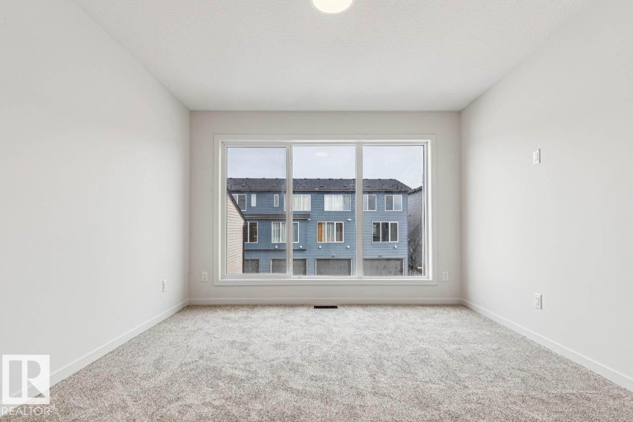 Photo 18 at 319 30 Street SW, Alces, Edmonton