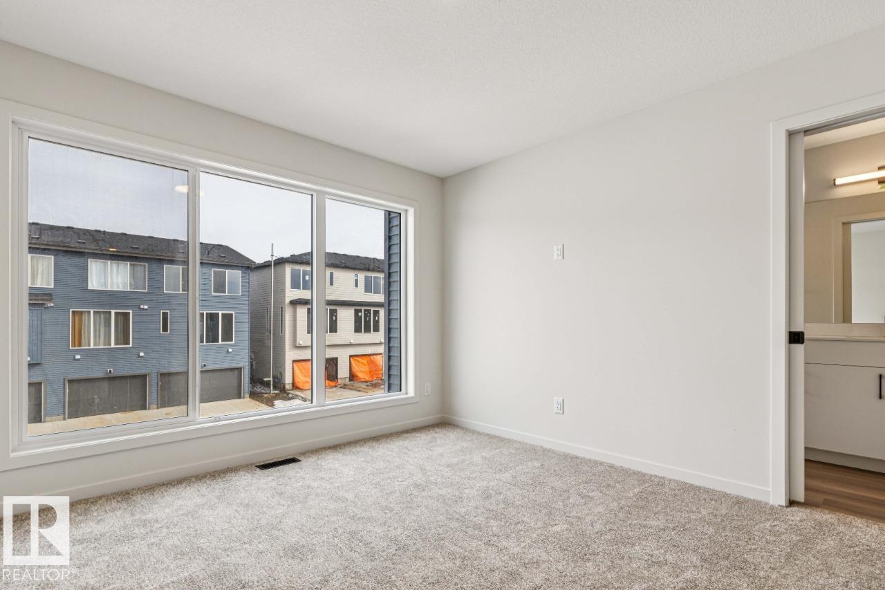 Photo 19 at 319 30 Street SW, Alces, Edmonton