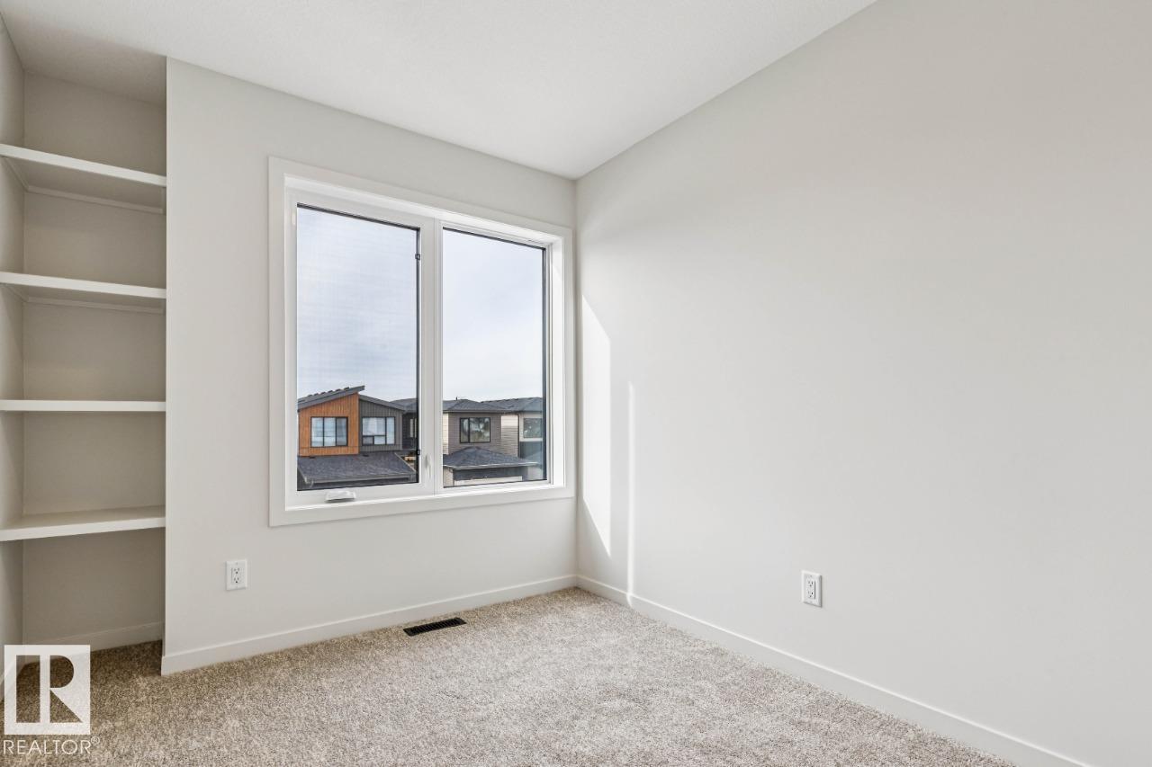 Photo 22 at 319 30 Street SW, Alces, Edmonton