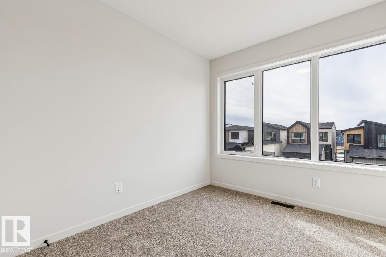 Photo 24 at 319 30 Street SW, Alces, Edmonton