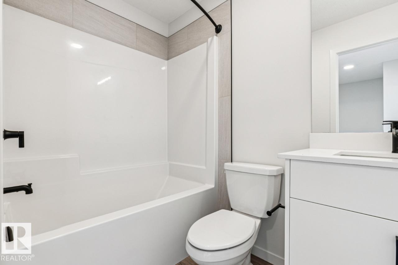 Photo 26 at 319 30 Street SW, Alces, Edmonton