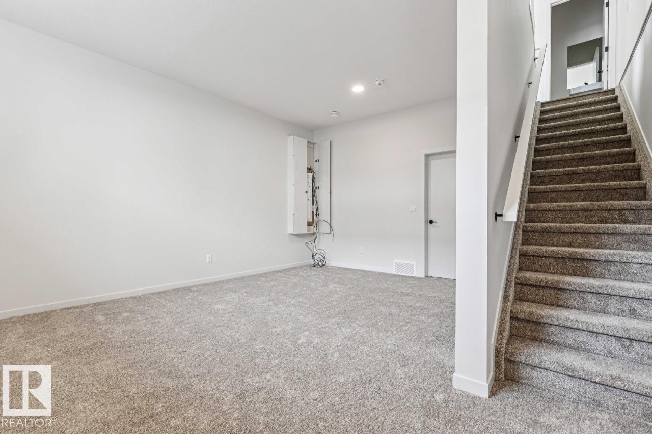 Photo 29 at 319 30 Street SW, Alces, Edmonton