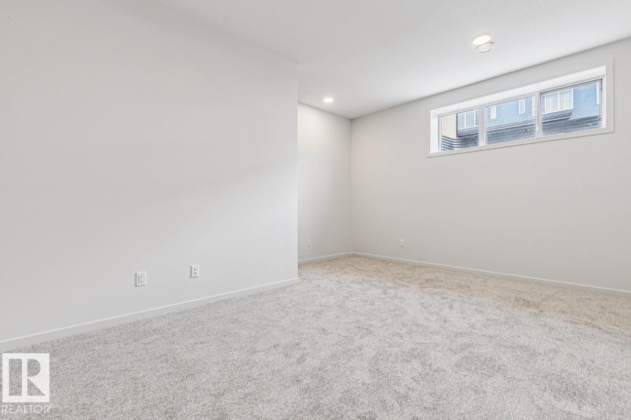 Photo 30 at 319 30 Street SW, Alces, Edmonton