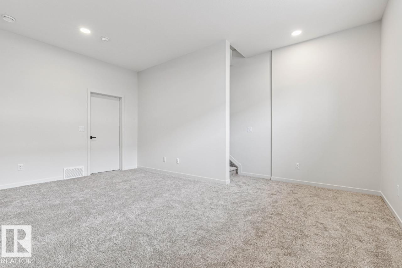 Photo 31 at 319 30 Street SW, Alces, Edmonton