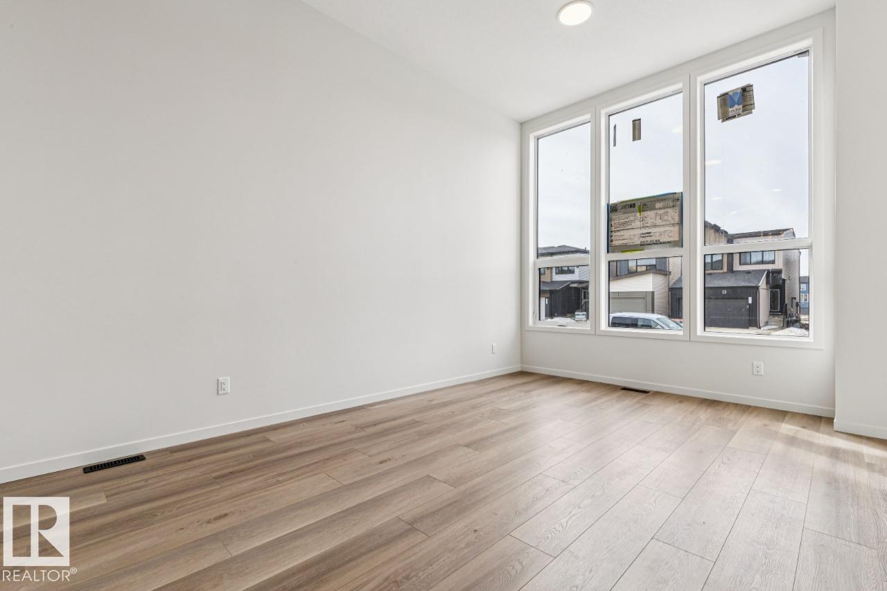 Photo 7 at 319 30 Street SW, Alces, Edmonton