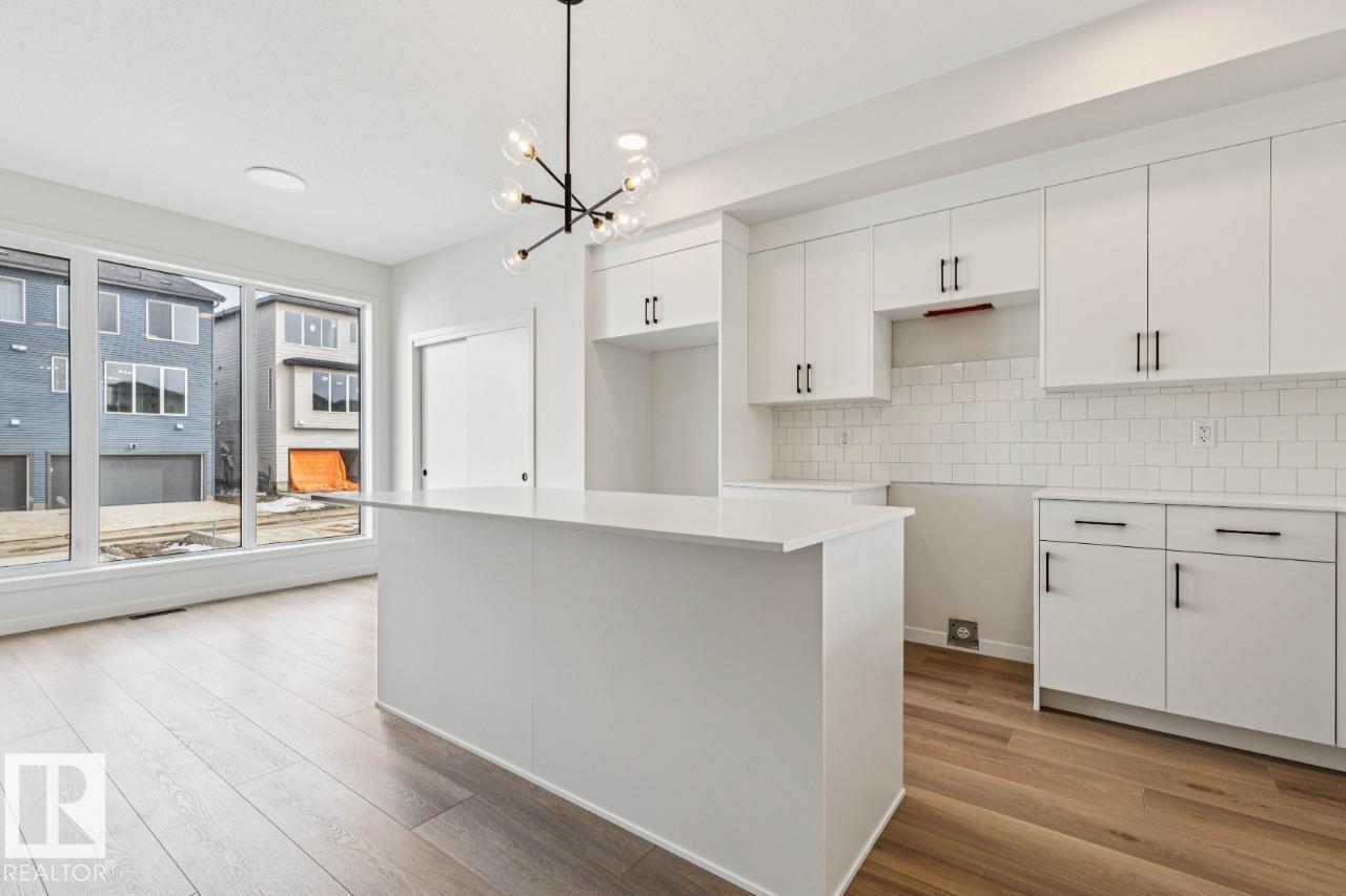 Photo 8 at 319 30 Street SW, Alces, Edmonton