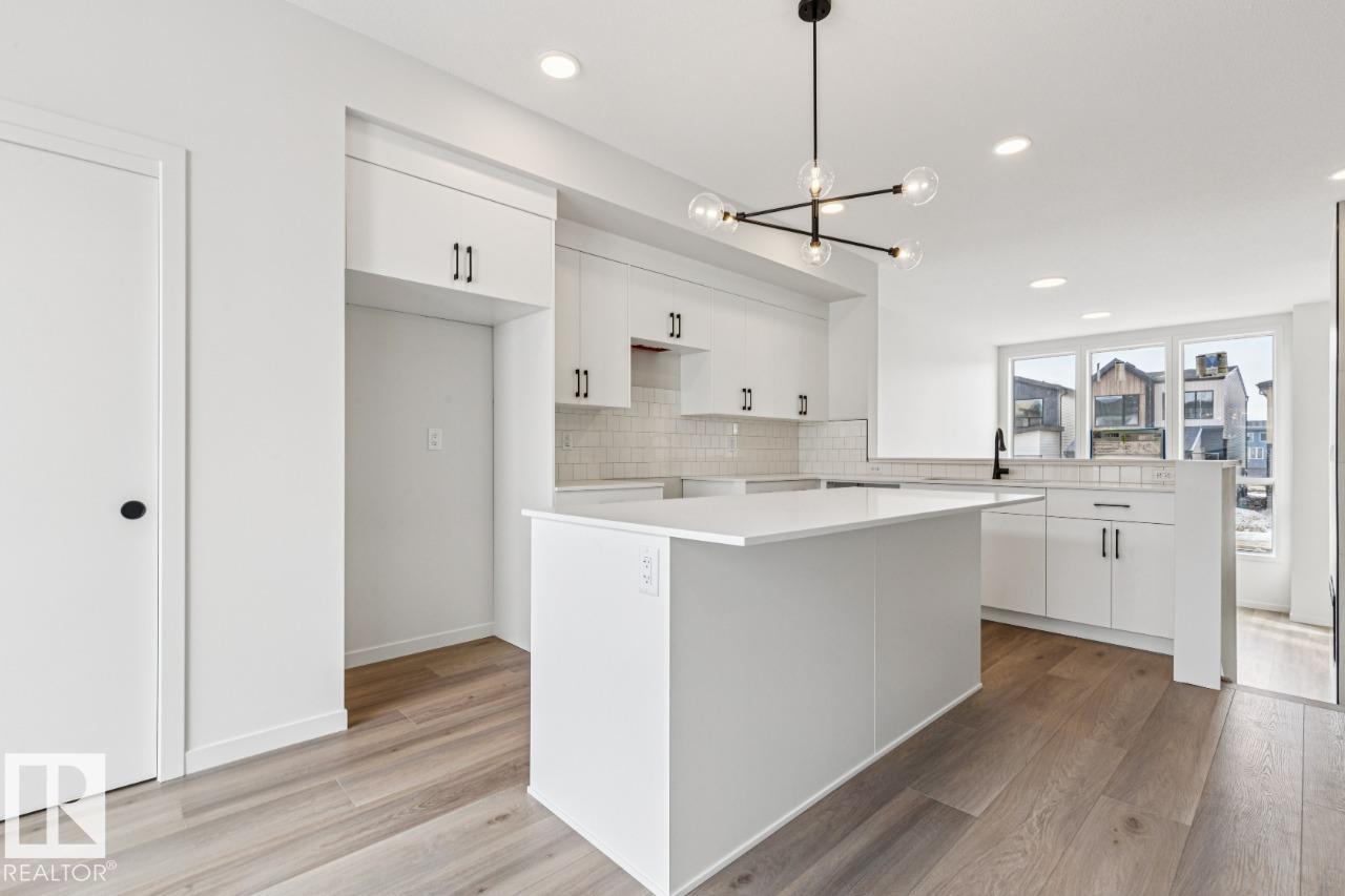 Photo 9 at 319 30 Street SW, Alces, Edmonton