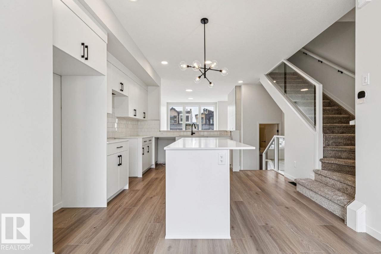 Photo 10 at 319 30 Street SW, Alces, Edmonton