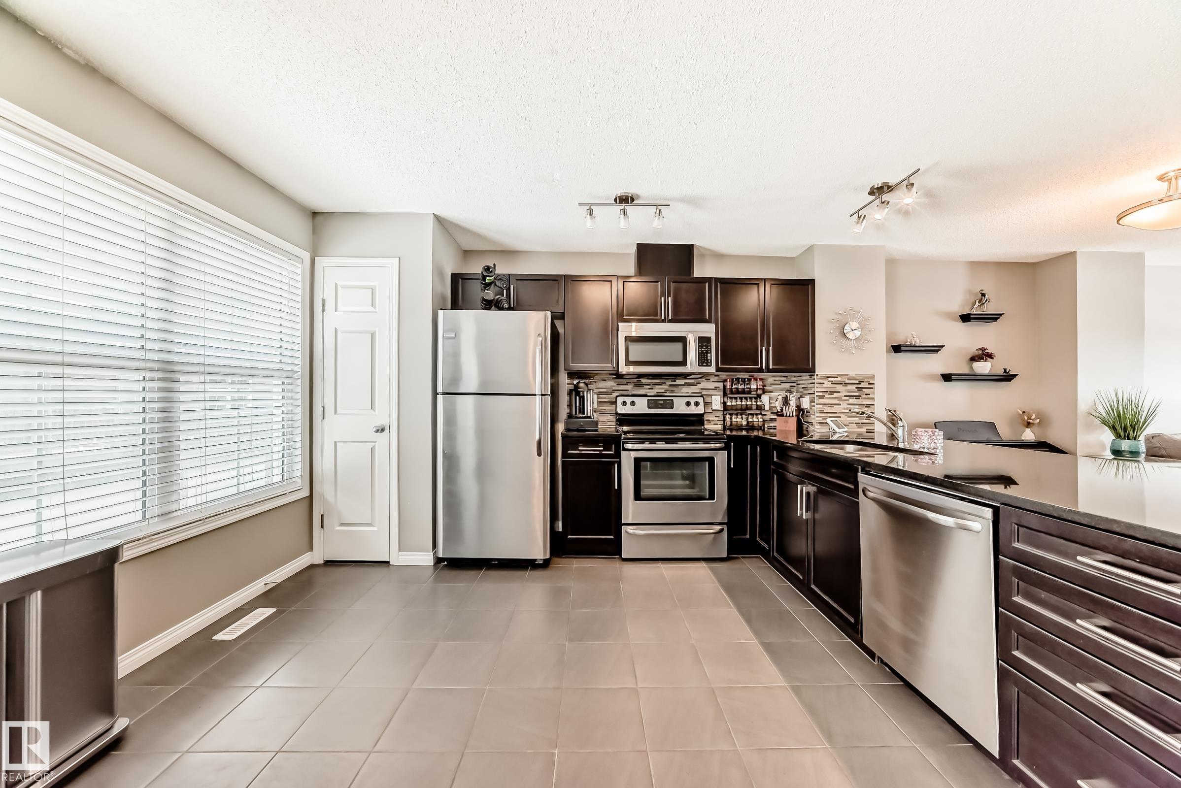 Photo 6 at 86 - 4029 Orchards Drive SW, The Orchards At Ellerslie, Edmonton