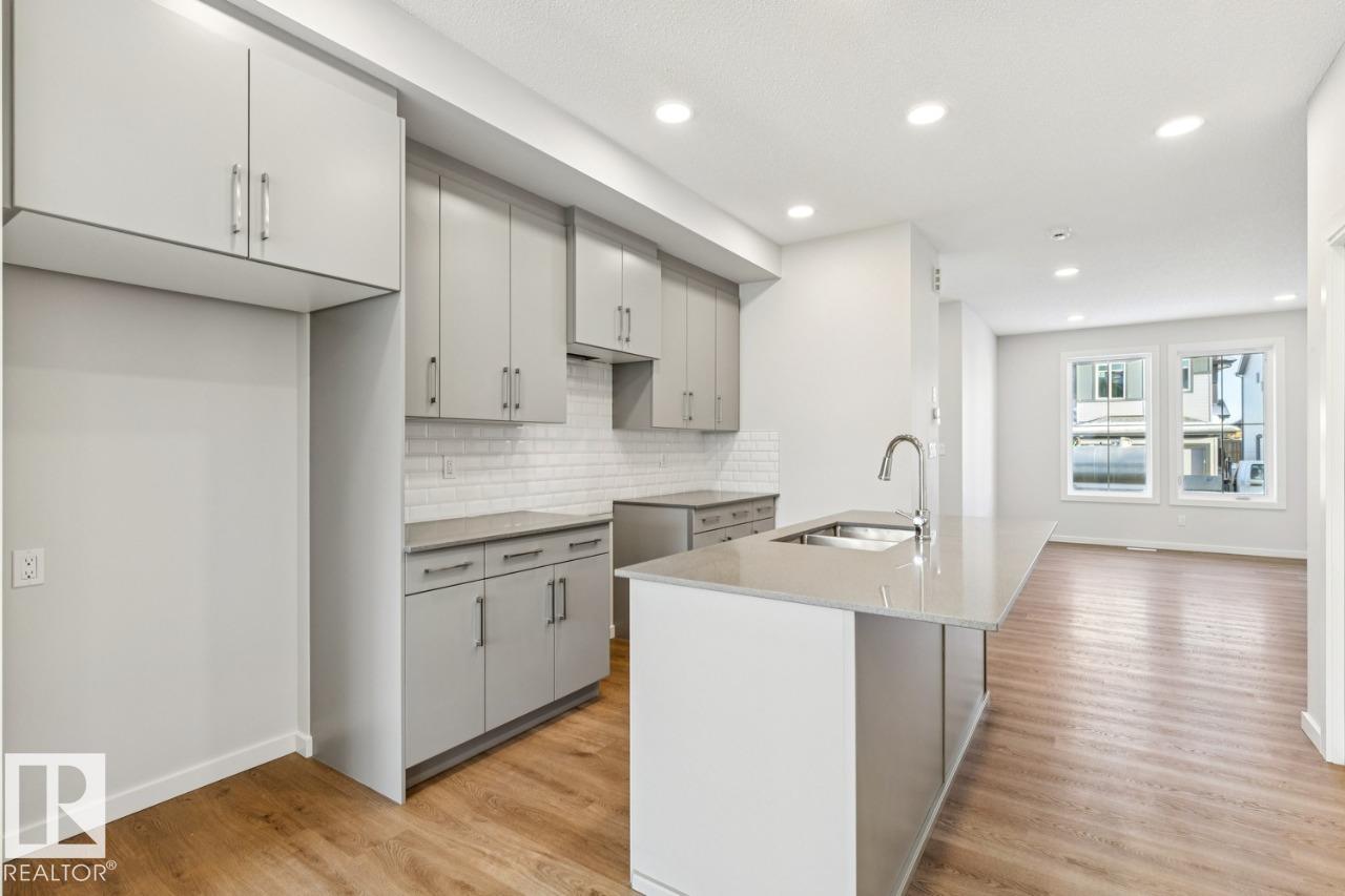 Photo 12 at 318 26 Street SW, Alces, Edmonton